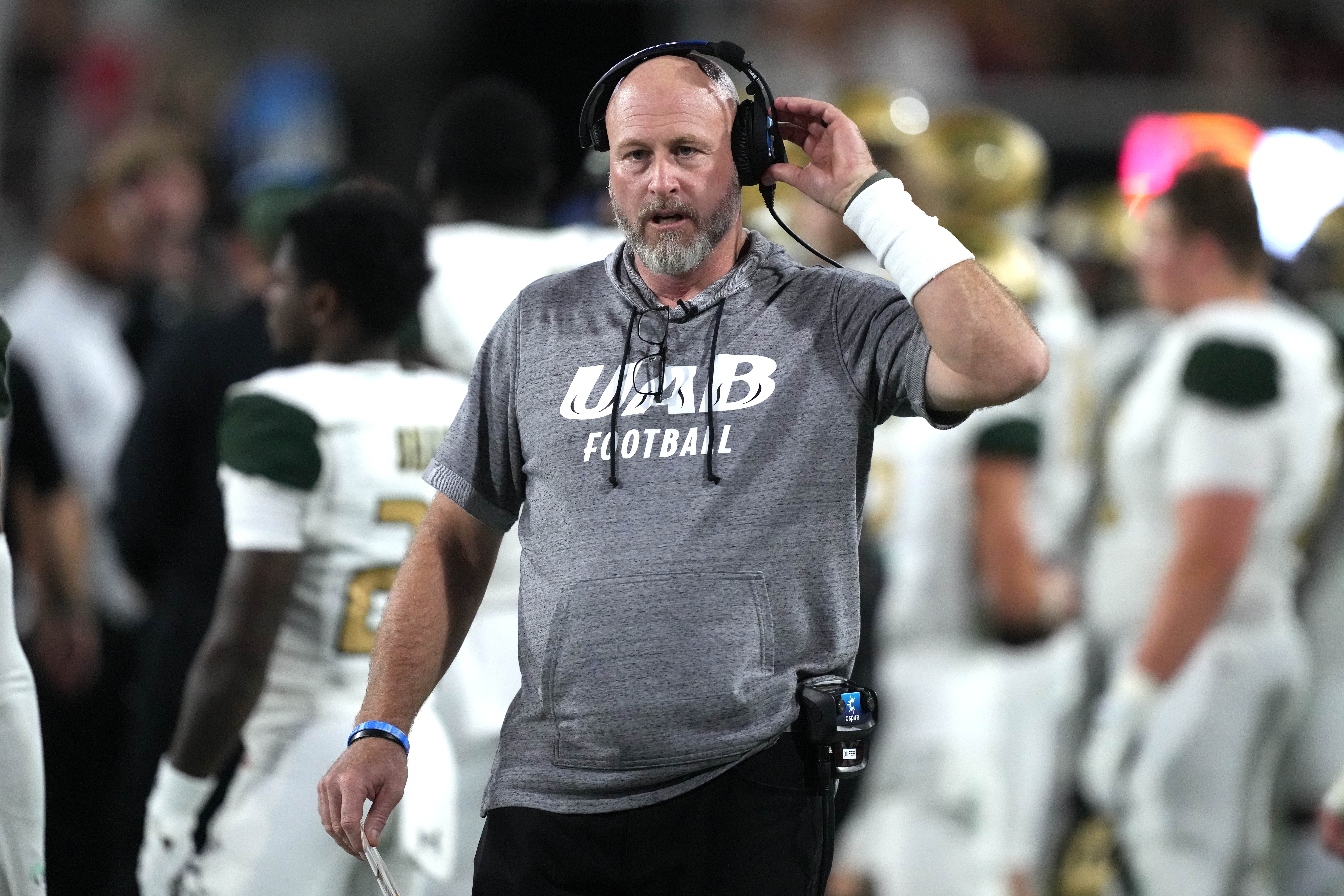Sep 23, 2023; Athens, Georgia, USA; UAB Blazers coach Trent Dilfer watches from the sidelines against the Georgia Bulldogs in the second half at Sanford Stadium.
