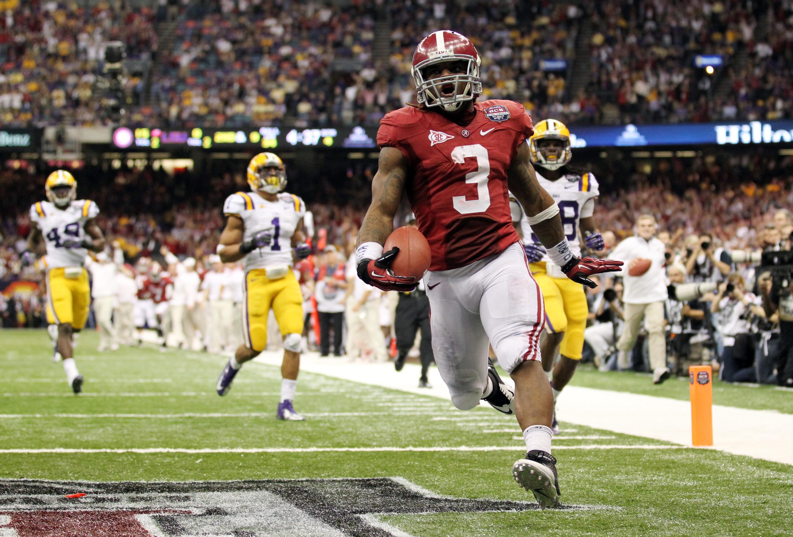 Jan 9, 2012; New Orleans, LA, USA; Alabama Crimson Tide running back Trent Richardson (3) celebrates after scoring a touchdown during the second half of the 2012 BCS National Championship game against the LSU Tigers at the Mercedes-Benz Superdome.