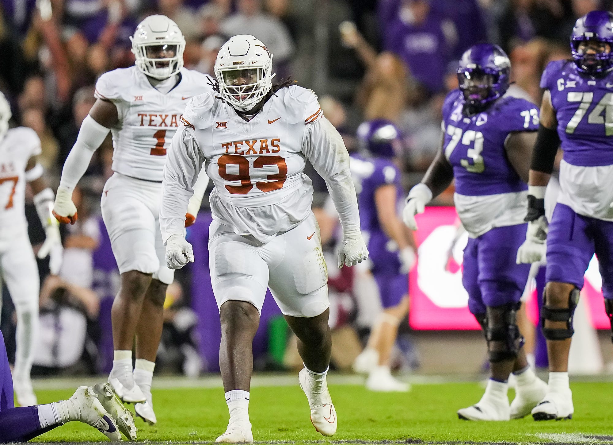 Texas Longhorns defensive lineman T'Vondre Sweat (93) celebrates a sack against TCU Horned Frogs quarterback Josh Hoover (10) in the first quarter of an NCAA college football game, Saturday, November. 11, 2023, at Amon G. Carter Stadium in Fort Worth, Texas.