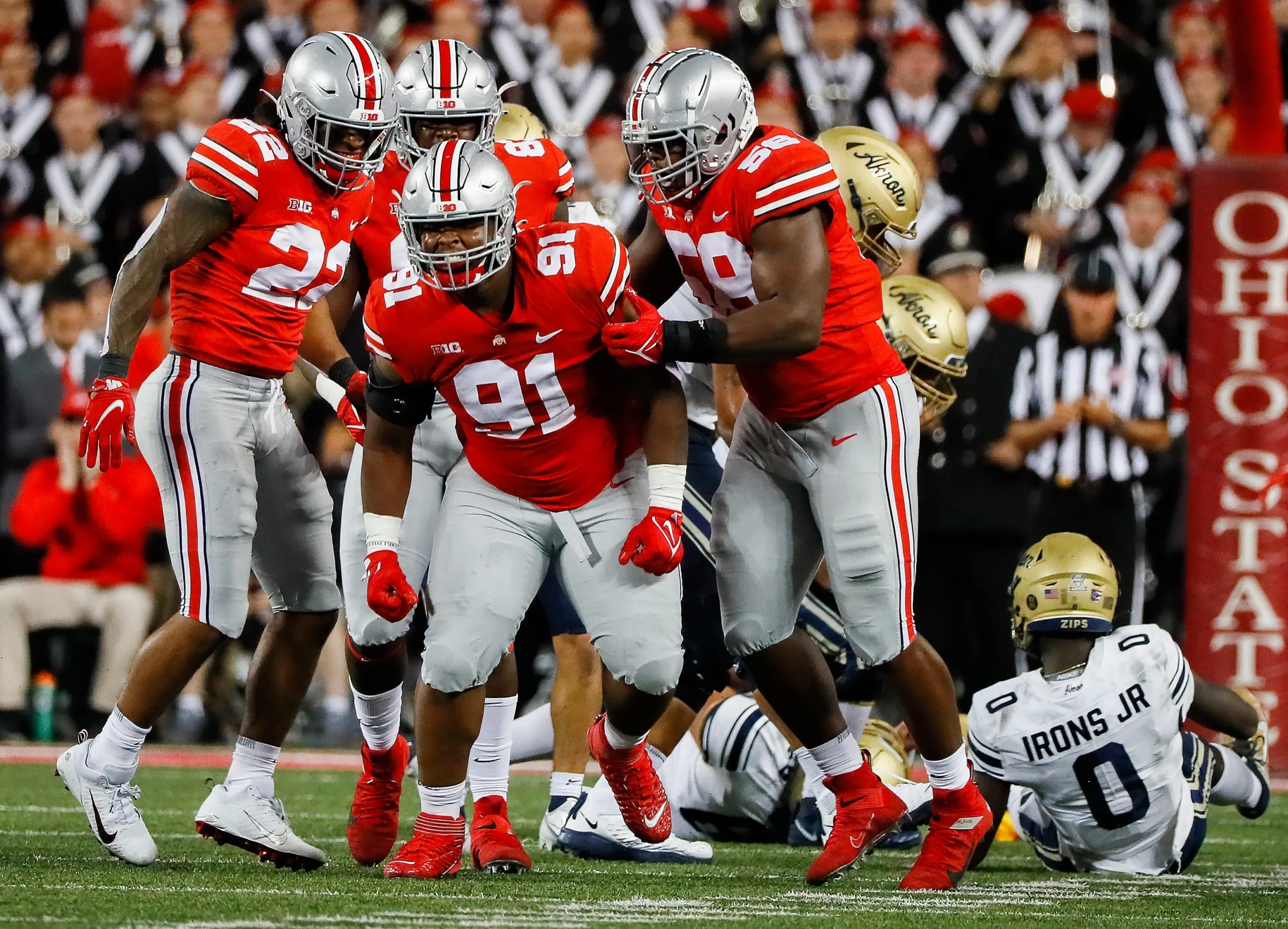Ohio State Buckeyes defensive tackle Tyleik Williams (91) celebrates after sacking Akron Zips quarterback DJ Irons (0) during the fourth quarter of a NCAA Division I football game between the Ohio State Buckeyes and the Akron Zips on Saturday, Sept. 25, 2021 at Ohio Stadium in Columbus, Ohio.