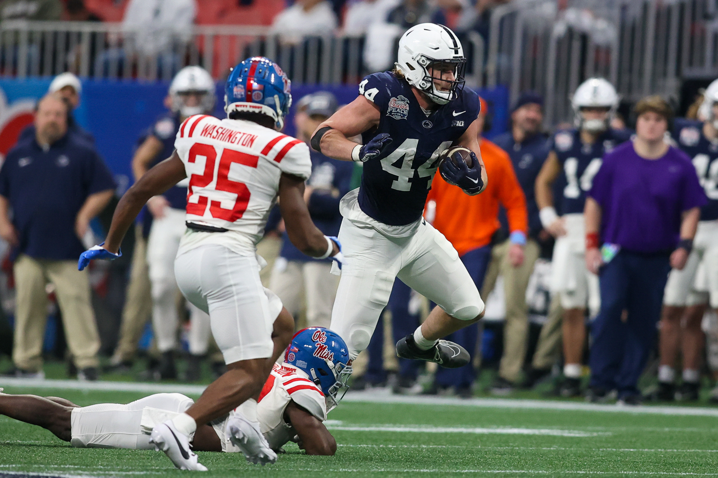 Dec 30, 2023; Atlanta, GA, USA; Penn State Nittany Lions tight end Tyler Warren (44) runs after a catch against the Mississippi Rebels in the second half at Mercedes-Benz Stadium.