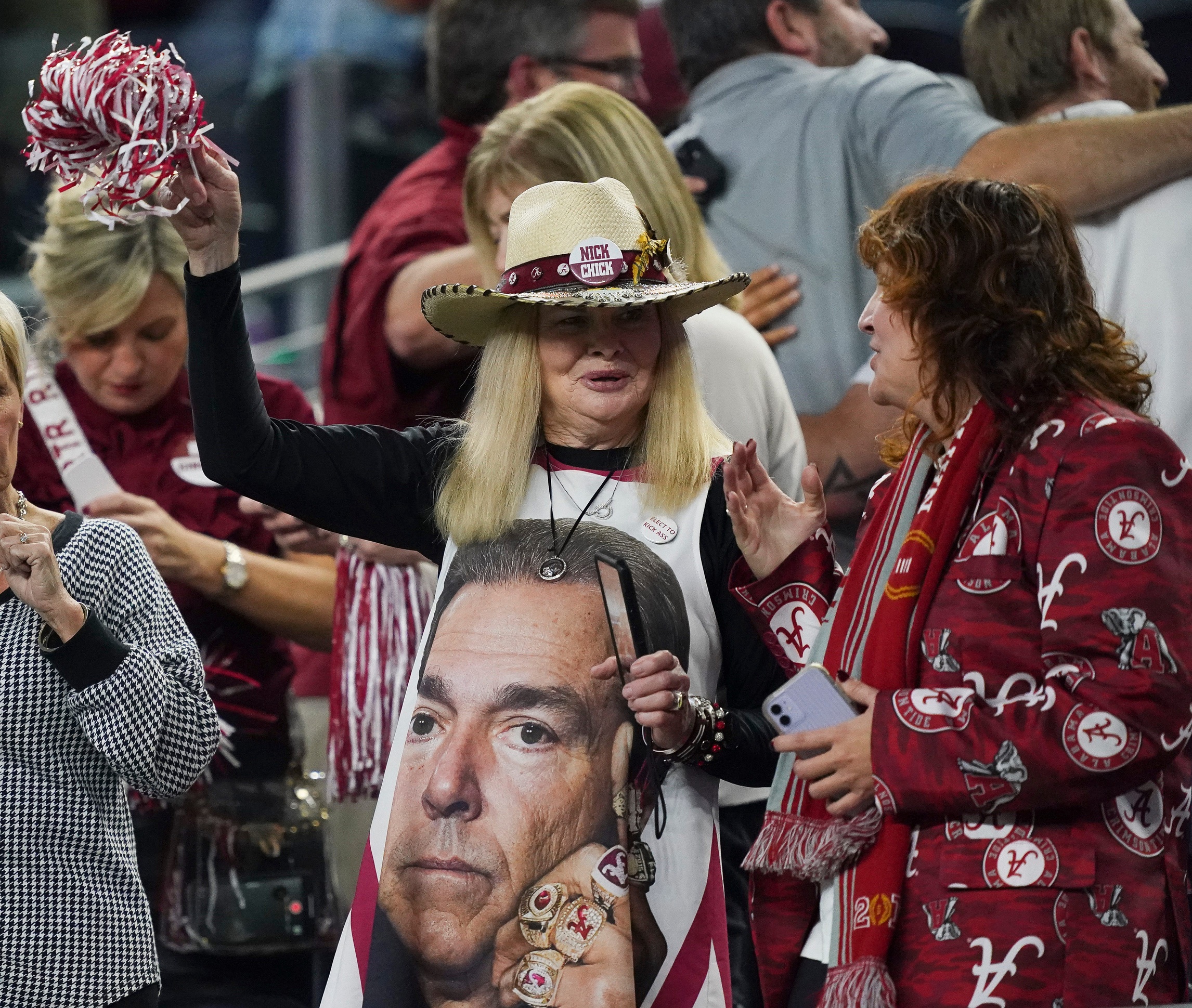 Alabama fans celebrate during the 2021 College Football Playoff Semifinal game at the 86th Cotton Bowl in AT&T Stadium in Arlington, Texas Friday, Dec. 31, 2021. Alabama defeated Cincinnati 27-6 to advance to the national championship game.