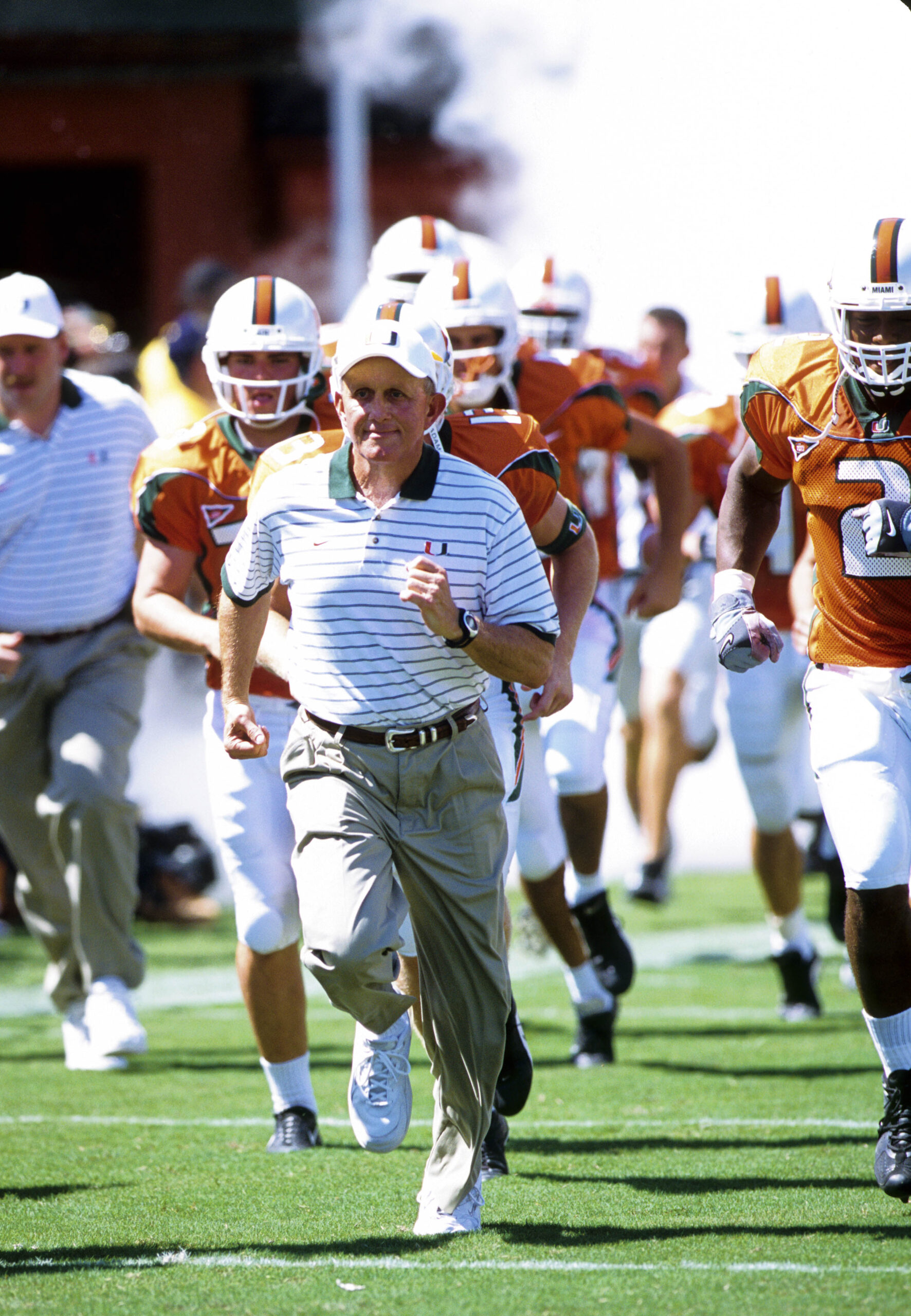 Unknown date, 2001; Coral Gables, FL, USA; FILE PHOTO; Miami Hurricanes head coach Larry Coker runs onto the field at Sun Life Stadium.