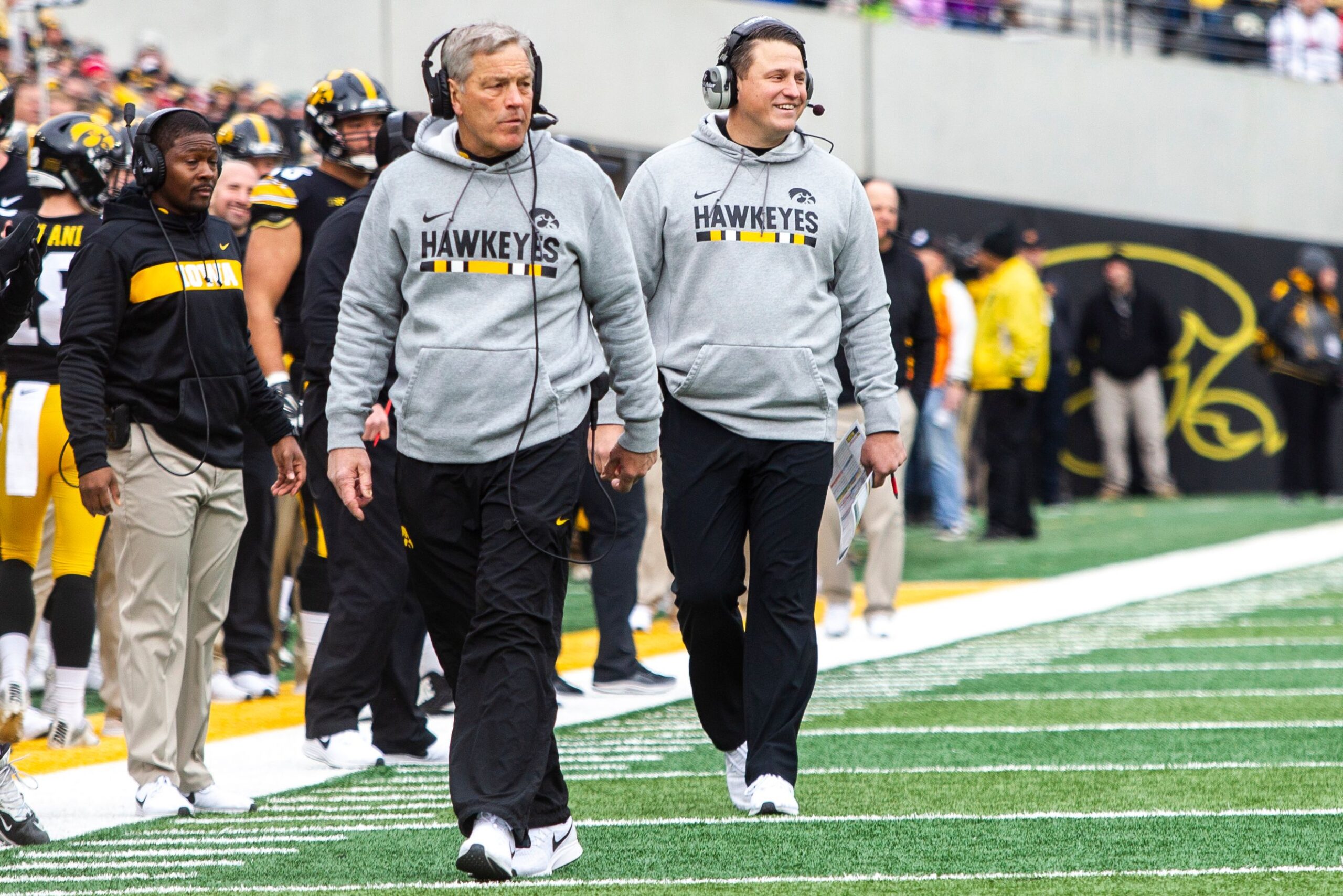 Iowa head coach Kirk Ferentz and Iowa offensive coordinator Brian Ferentz walk on the sideline during a Big Ten Conference NCAA football game on Friday, Nov. 23, 2018, at Kinnick Stadium in Iowa City.
