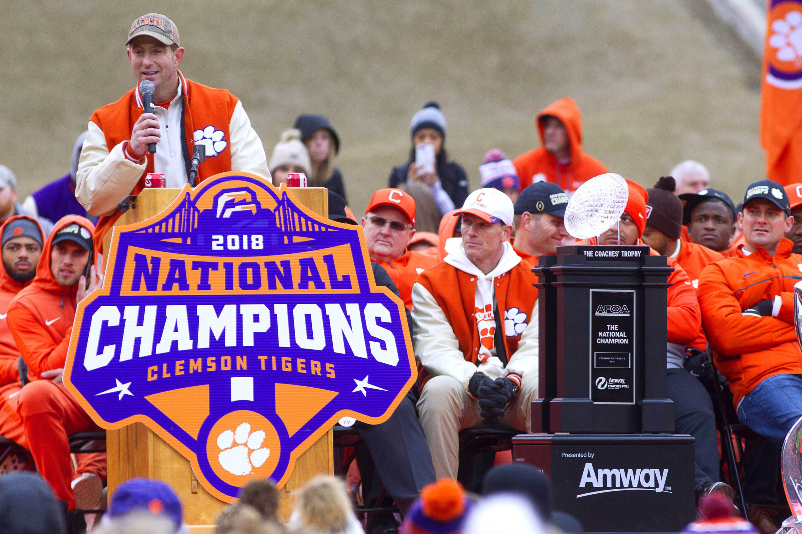 Jan 12, 2019; Clemson, SC, USA; Clemson University head football coach Dabo Swinney addresses the crowd in Memorial Stadium while beside the American Football Coaches Association (AFCA) Coaches Trophy presented by Amway during the team s national championship celebration in Clemson, SC on Saturday.