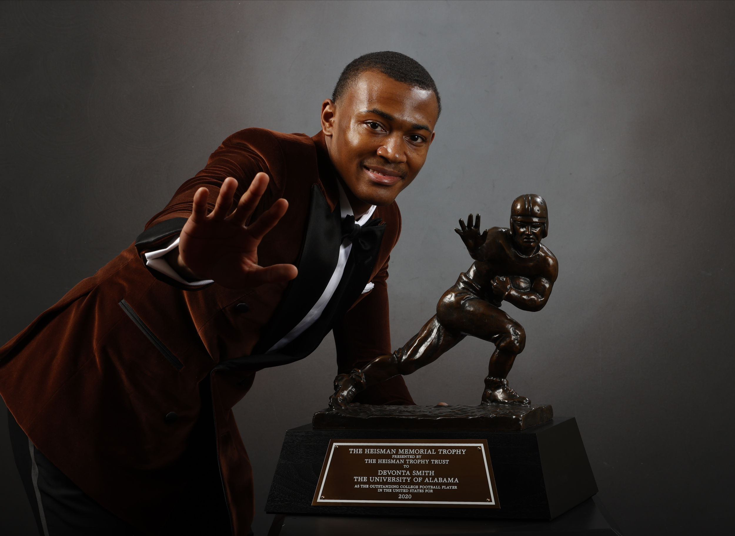 Jan 5, 2021; Tuscaloosa, AL, USA; Alabama Crimson Tide wide receiver DeVonta Smith poses for a photo after being announced the winner of the 2020 Heisman Trophy.