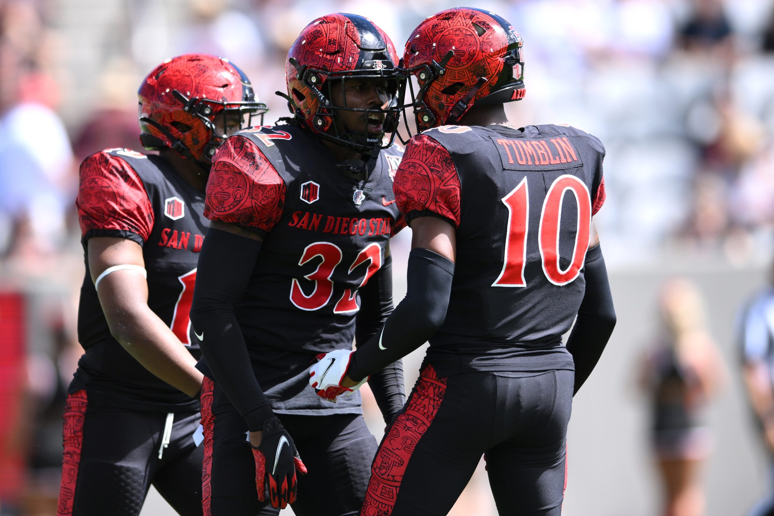 Sep 24, 2022; San Diego, California, USA; San Diego State Aztecs cornerback Dez Malone (32) is congratulated by cornerback Noah Tumblin (10) after breaking up a pass against the Toledo Rockets during the first half at Snapdragon Stadium.