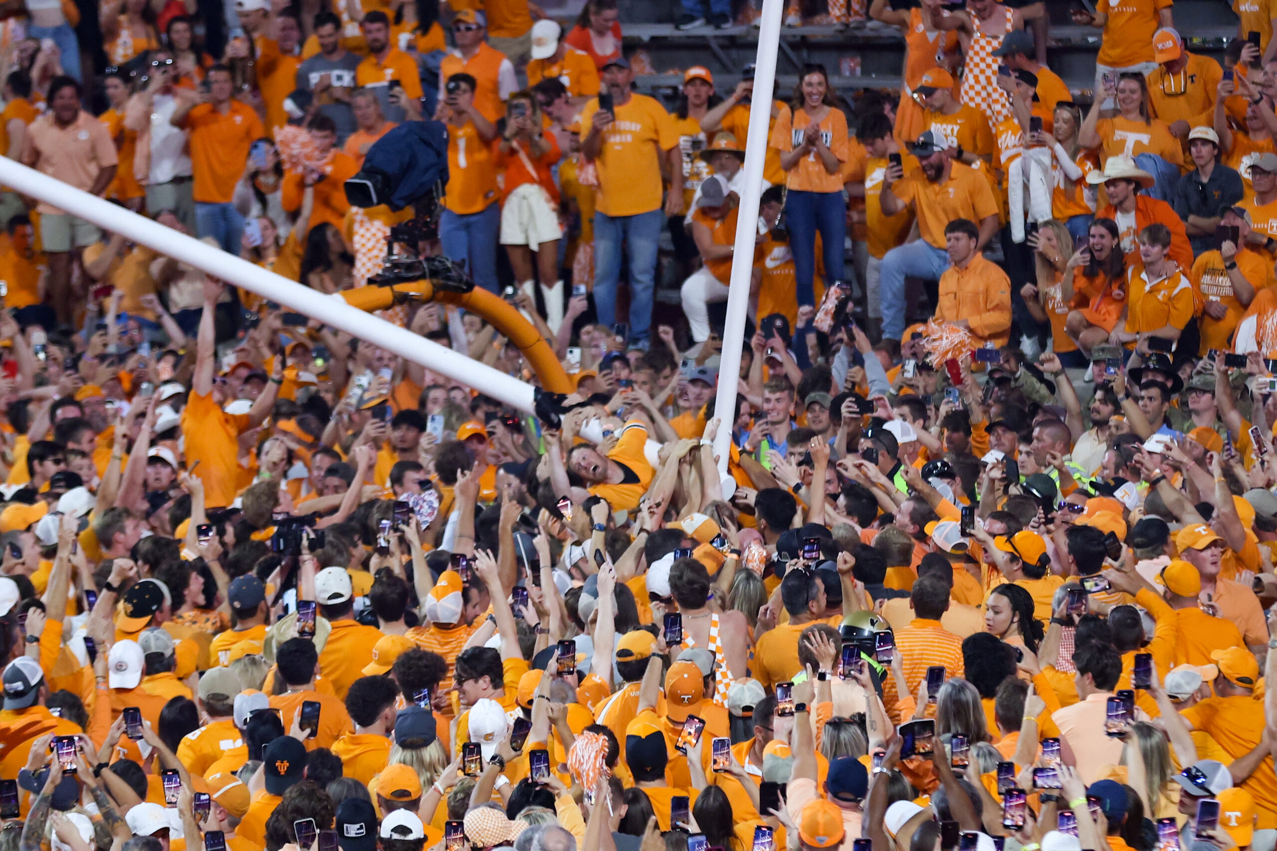 Oct 15, 2022; Knoxville, Tennessee, USA; Tennessee Volunteers fans tear down the goal posts after beating the Alabama Crimson Tide at Neyland Stadium.