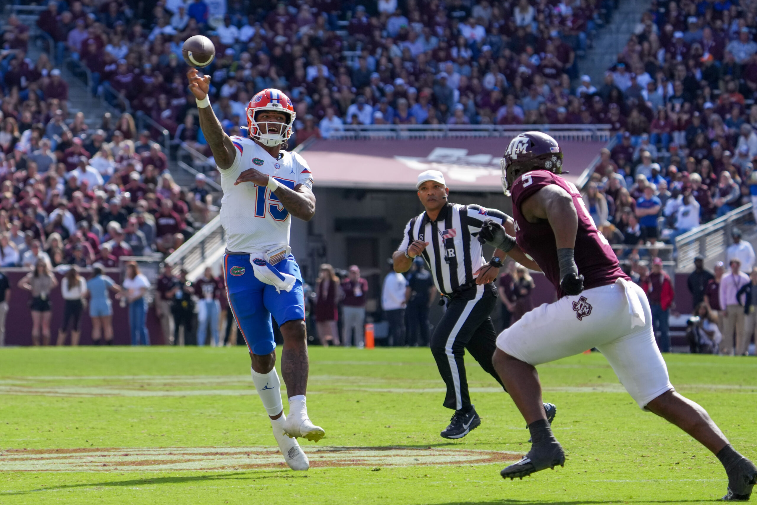 Nov 5, 2022; College Station, Texas, USA; Florida Gators quarterback Anthony Richardson (15) throws a pass in front of Texas A&M Aggies defensive lineman Shemar Turner (5) in the second half at Kyle Field.