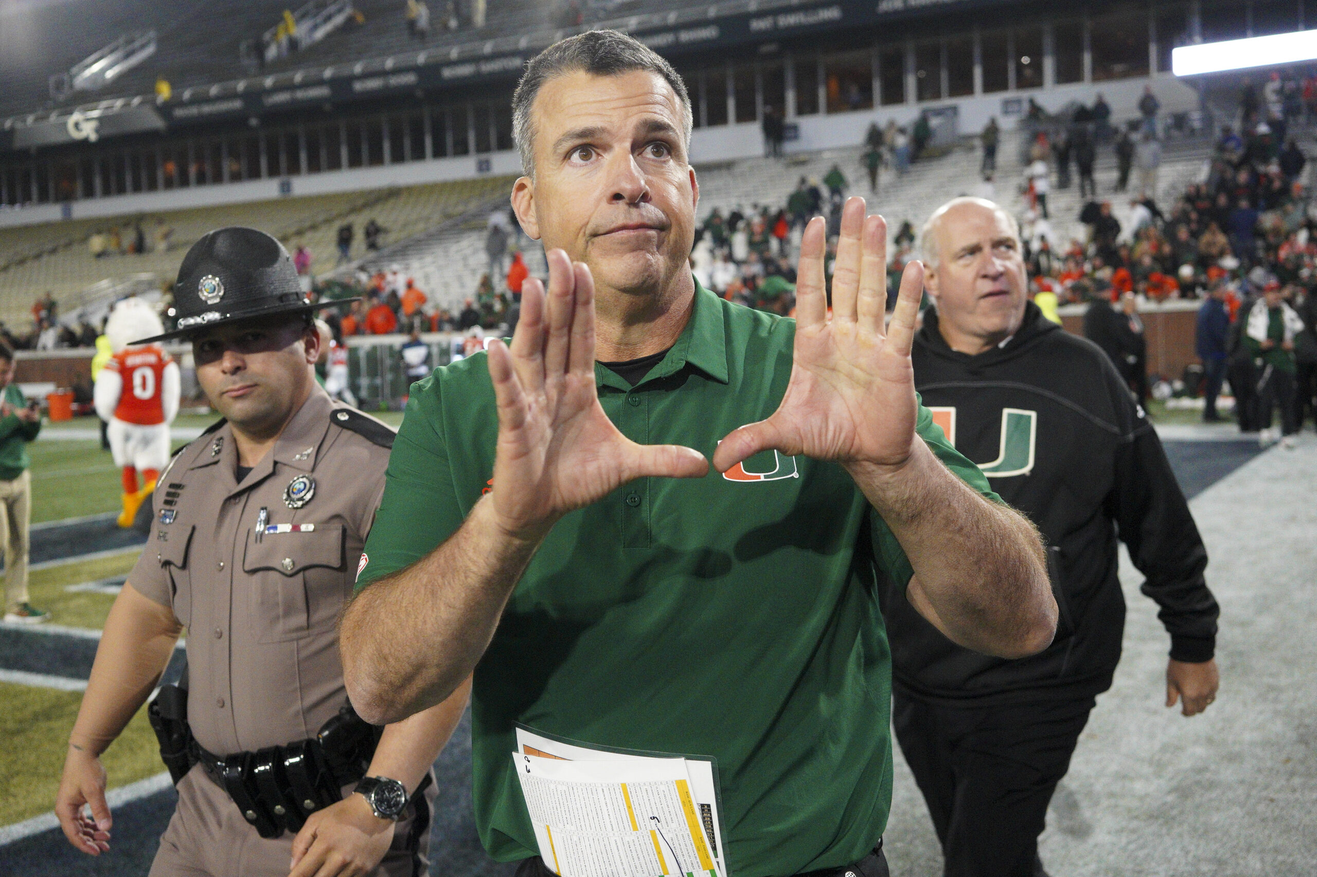Nov 12, 2022; Atlanta, Georgia, USA; Miami Hurricanes head coach Mario Cristobal celebrates after a victory against the Georgia Tech Yellow Jackets at Bobby Dodd Stadium. 