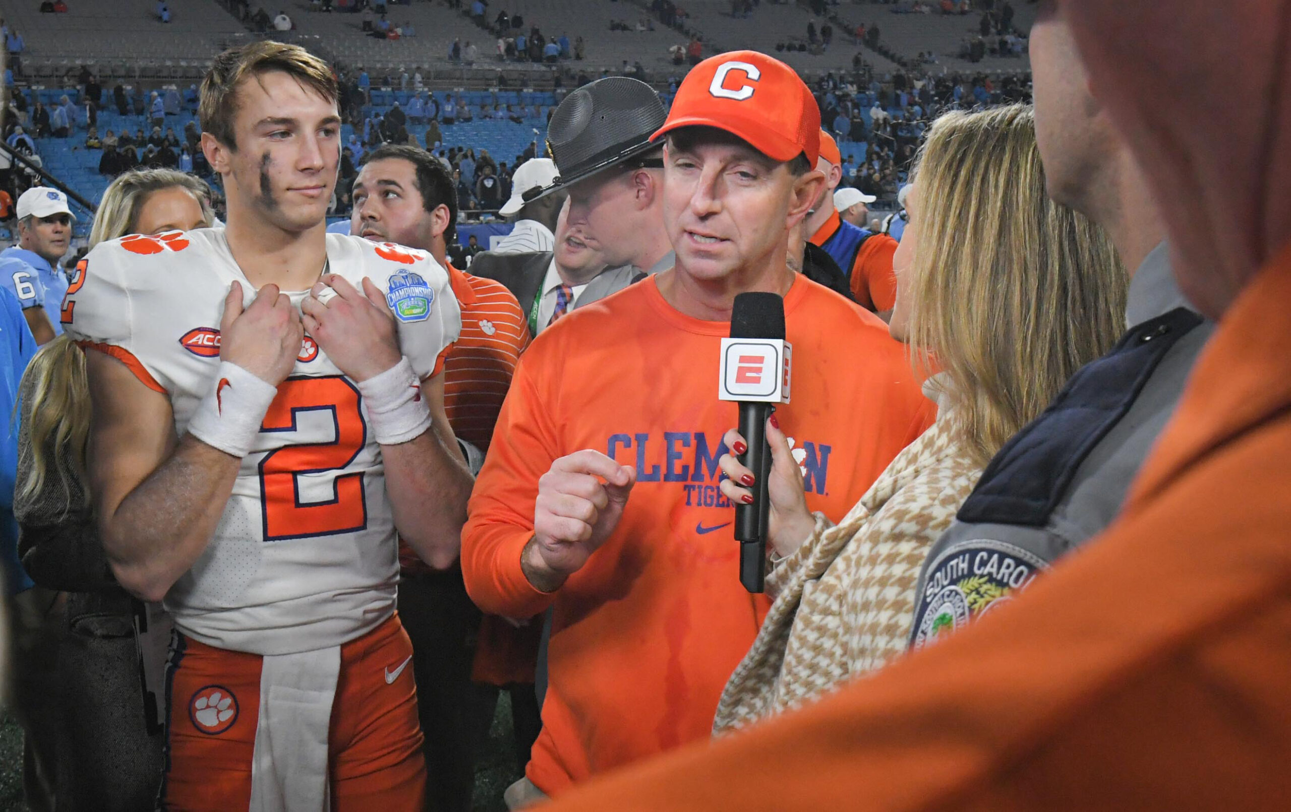 Clemson head coach Dabo Swinney is interviewed by ESPN near quarterback Cade Klubnik (2), game MVP, after the game with North Carolina in the ACC Championship football gameat Bank of America Stadium in Charlotte, North Carolina Saturday, Dec 3, 2022. Clemson won 39-10.