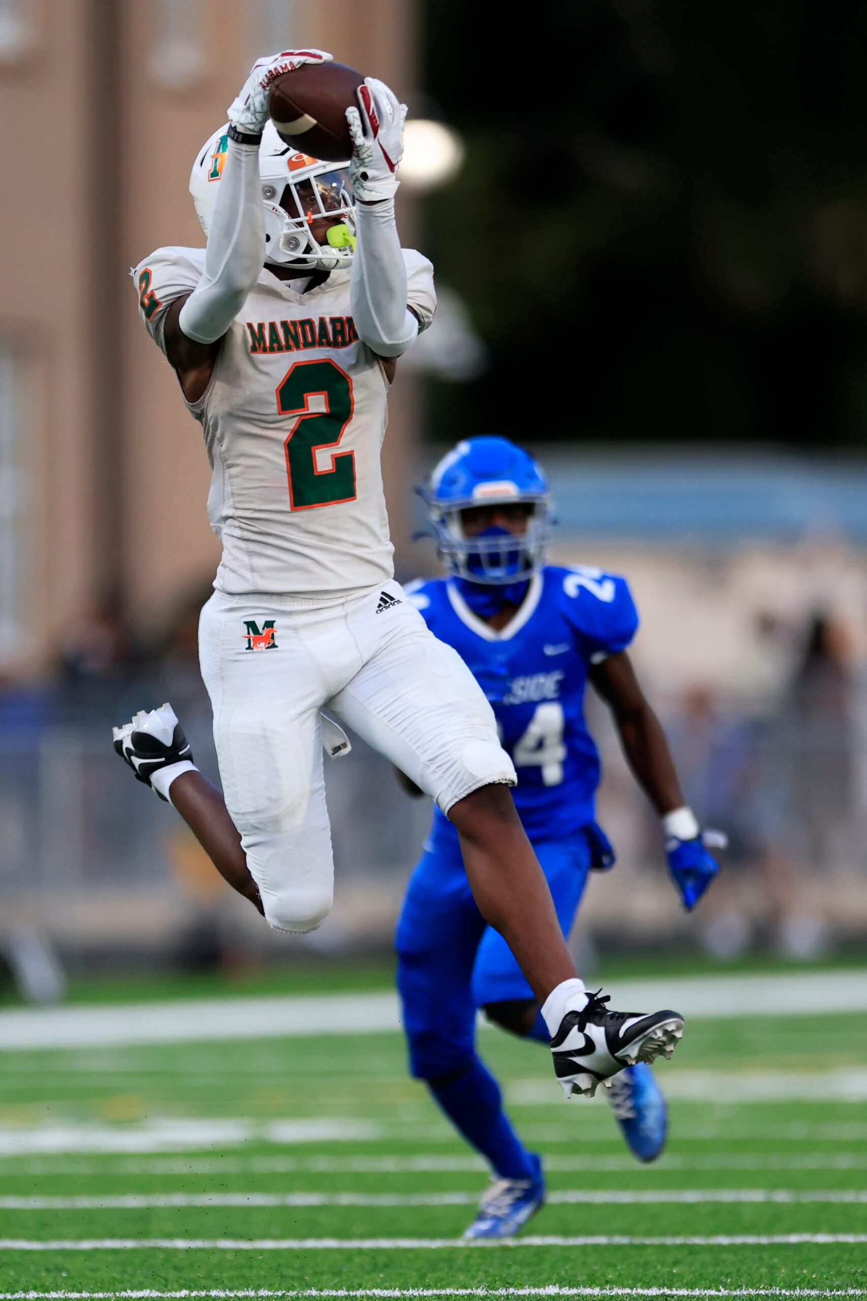 Mandarin's Jaime Ffrench Jr. (2) catches a pass against Riverside's Ronald 