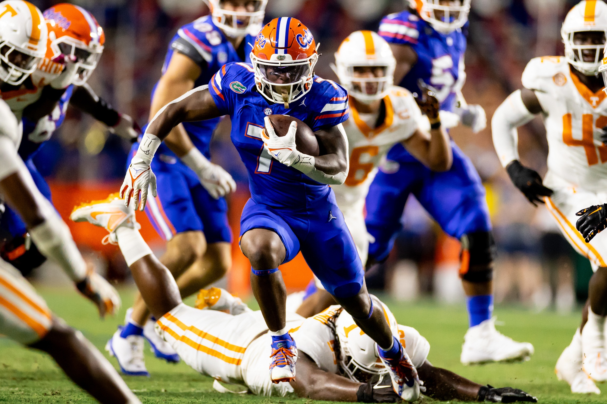 Sep 16, 2023; Gainesville, Florida, USA; Florida Gators running back Trevor Etienne (7) rushes with the ball during the first half against the Tennessee Volunteers at Ben Hill Griffin Stadium