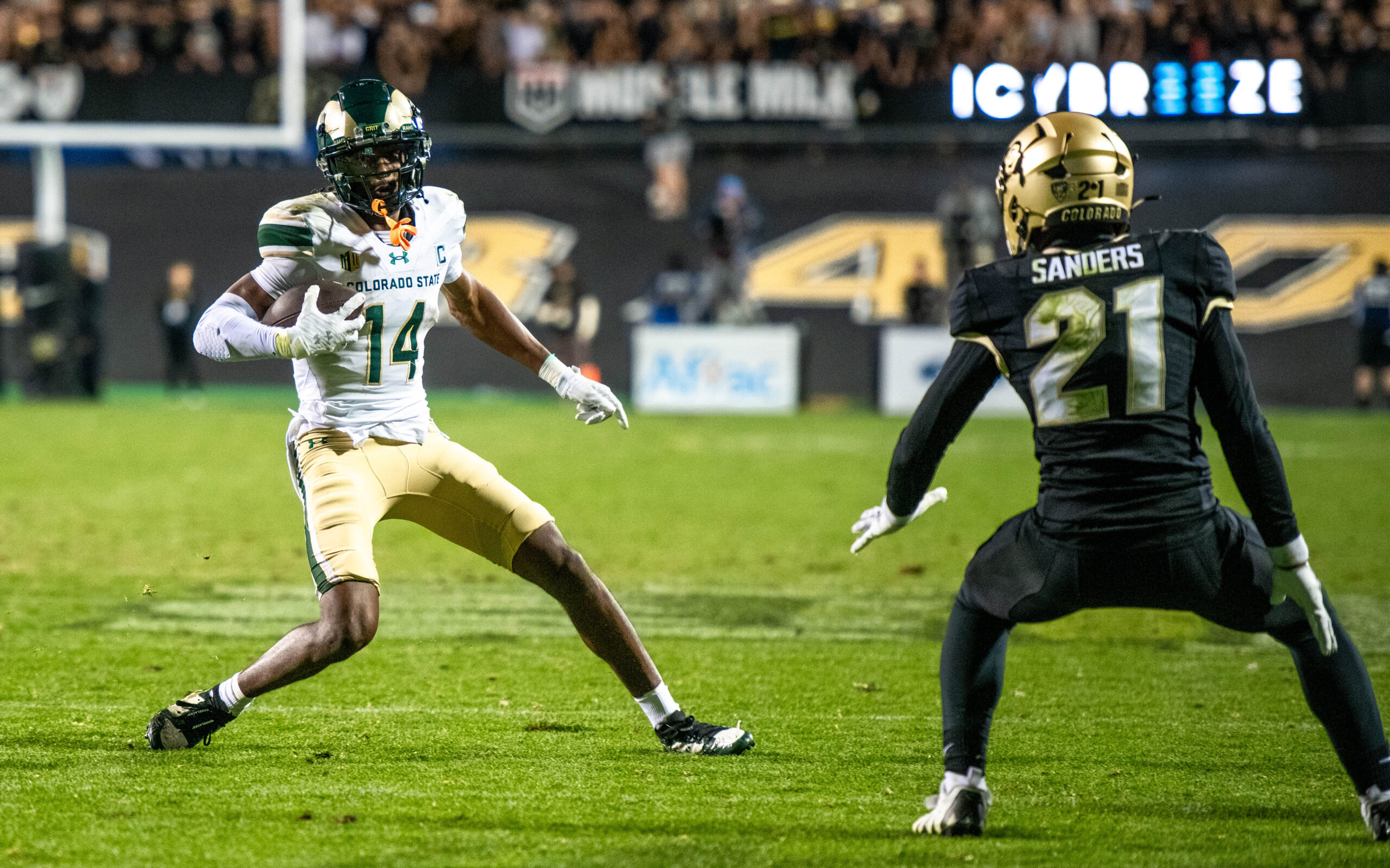 CSU football's senior wide receiver Tory Horton (14) makes a move in the open field against CU's Shilo Sanders in the Rocky Mountain Showdown on Sept. 16, 2023 at Folsom Field in Boulder, Colo.
