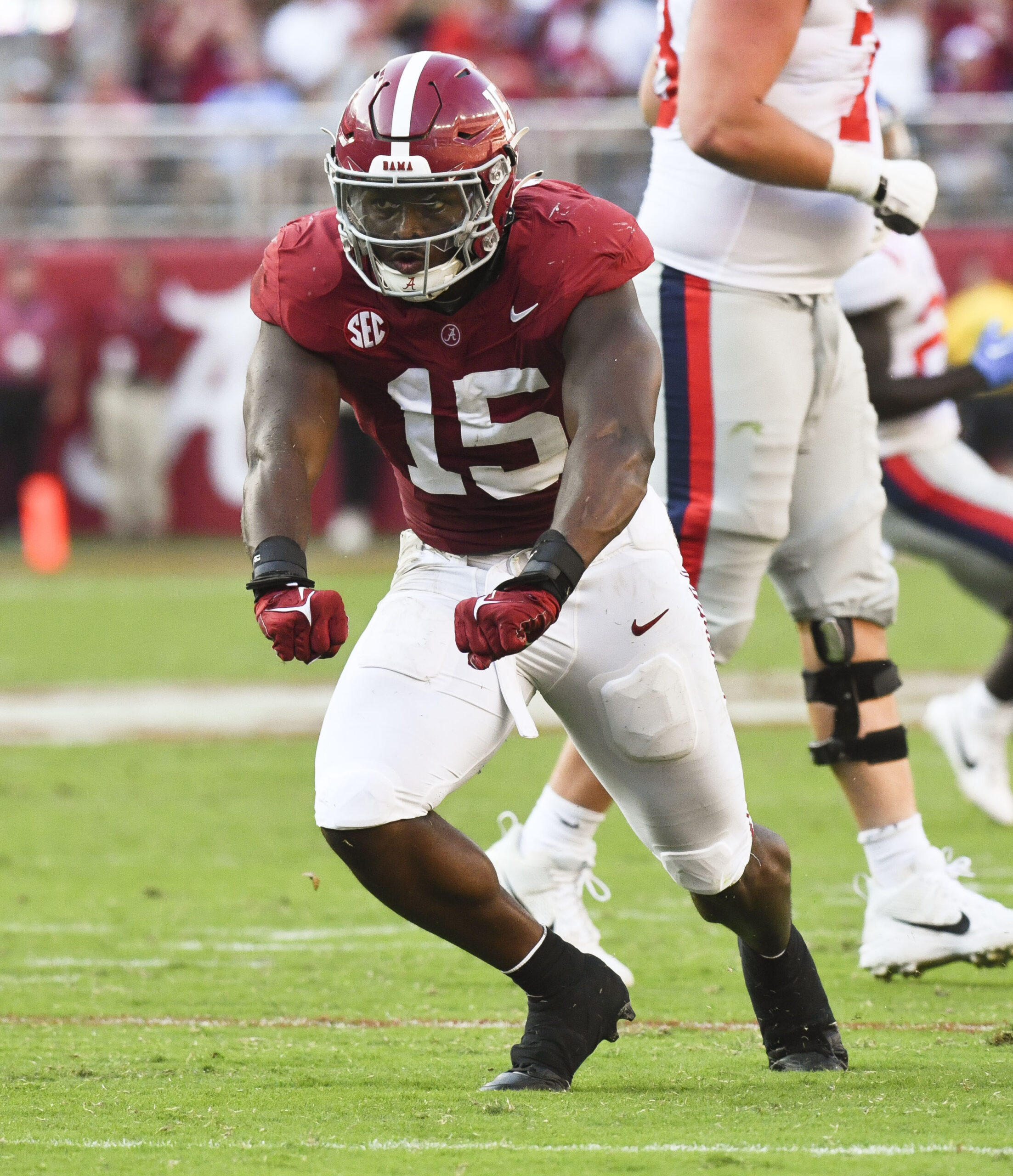 Sep 23, 2023; Tuscaloosa, Alabama, USA; Alabama Crimson Tide linebacker Dallas Turner (15) celebrates after sacking Mississippi Rebels quarterback Jaxson Dart (2) at Bryant-Denny Stadium. Alabama defeated Mississippi 24-10. Mandatory Credit: Gary Cosby Jr.-USA TODAY Sports