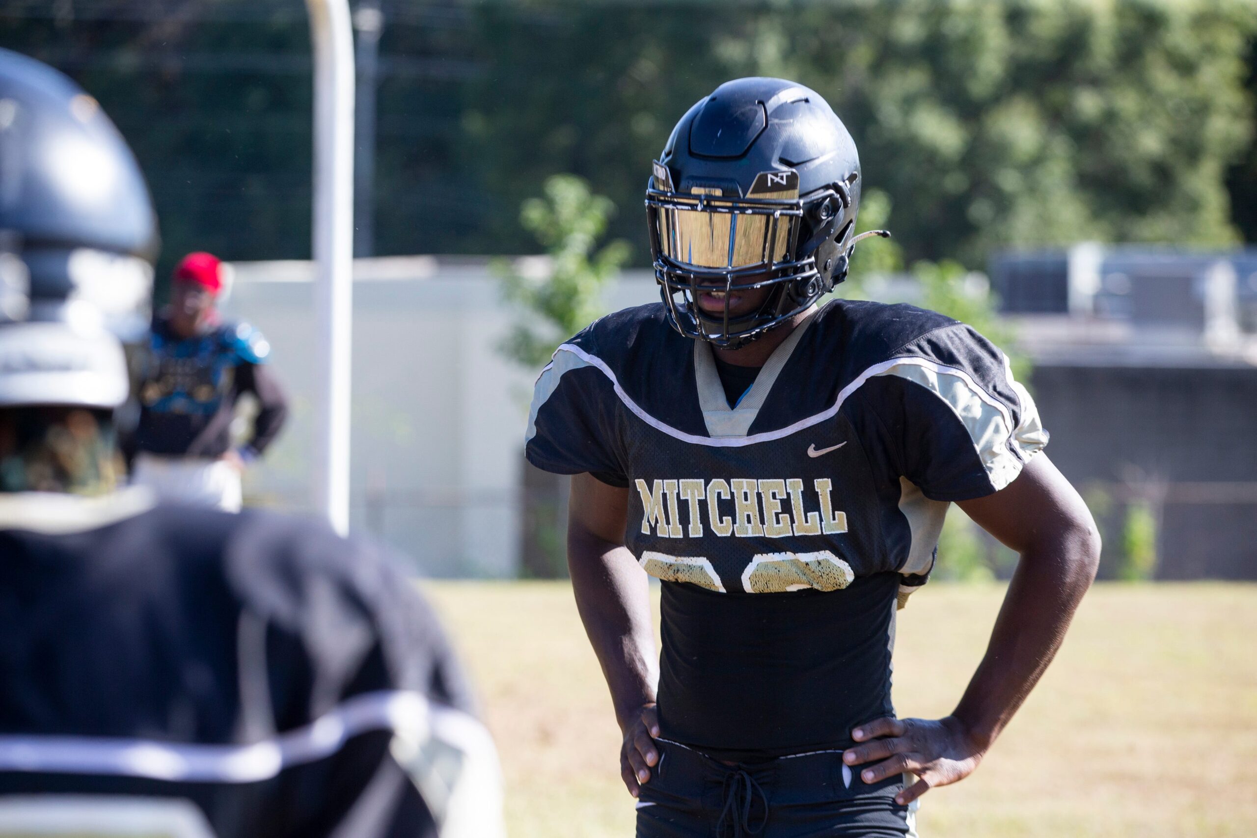 Mitchell's Kenderrius Robertson waits for the next defensive drill during football practice.