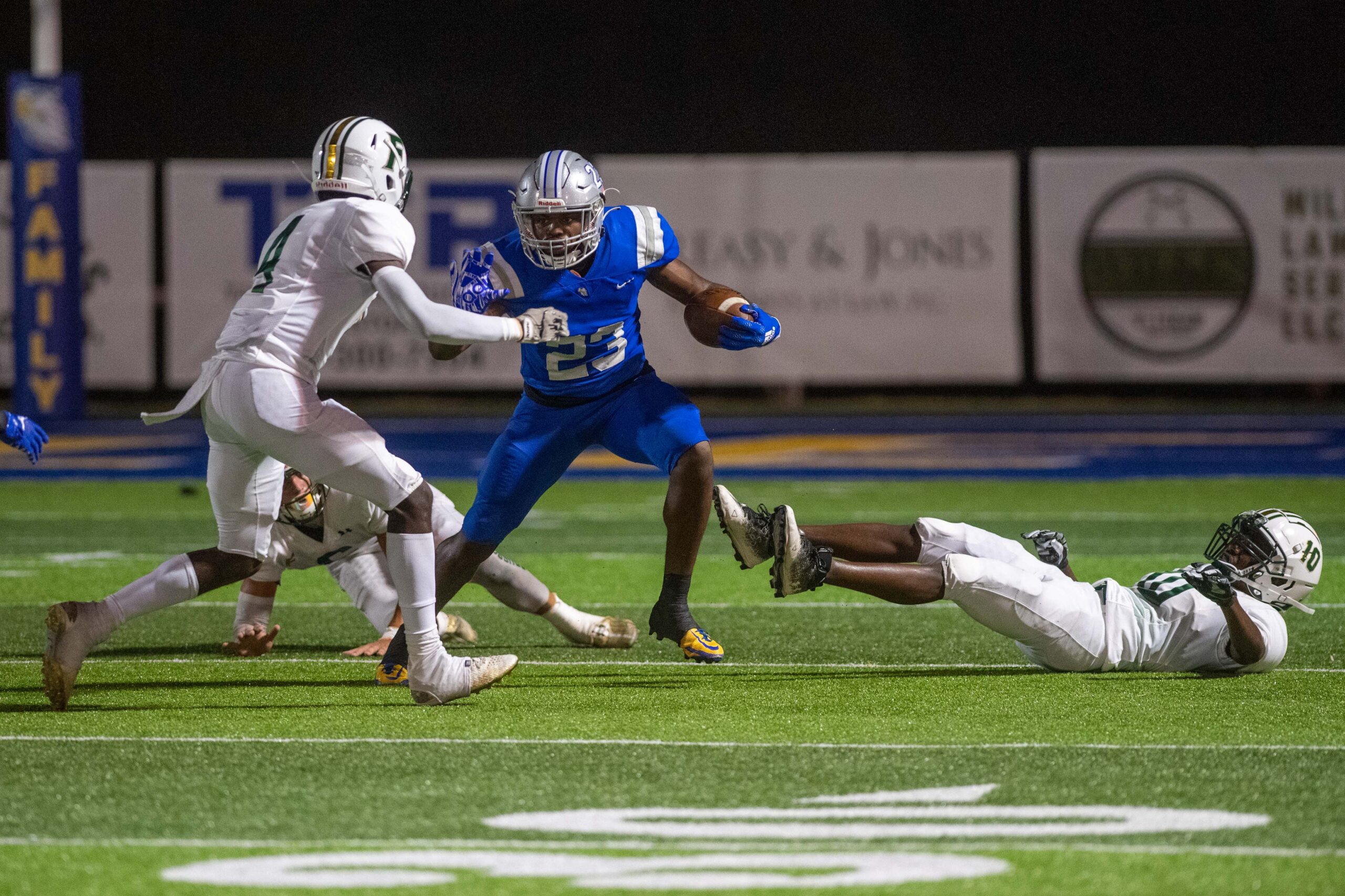 Jackson Christian's Jay'Len Mosley tries to evade Crusader defenders.
