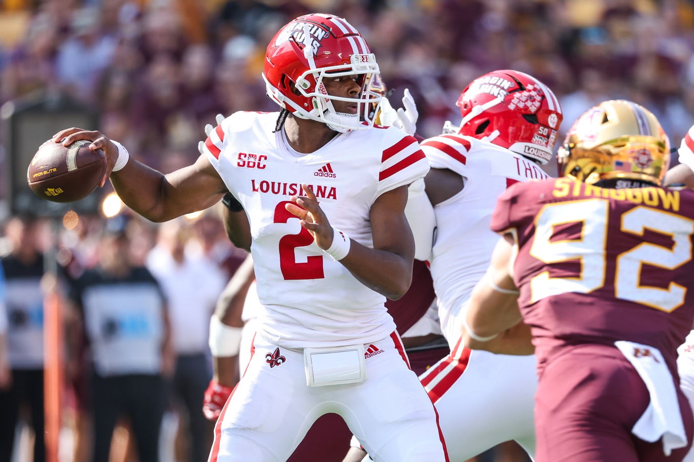 Sep 30, 2023; Minneapolis, Minnesota, USA; Louisiana-Lafayette Ragin Cajuns quarterback Zeon Chriss (2) passes against the Minnesota Golden Gophers during the first quarter at Huntington Bank Stadium.