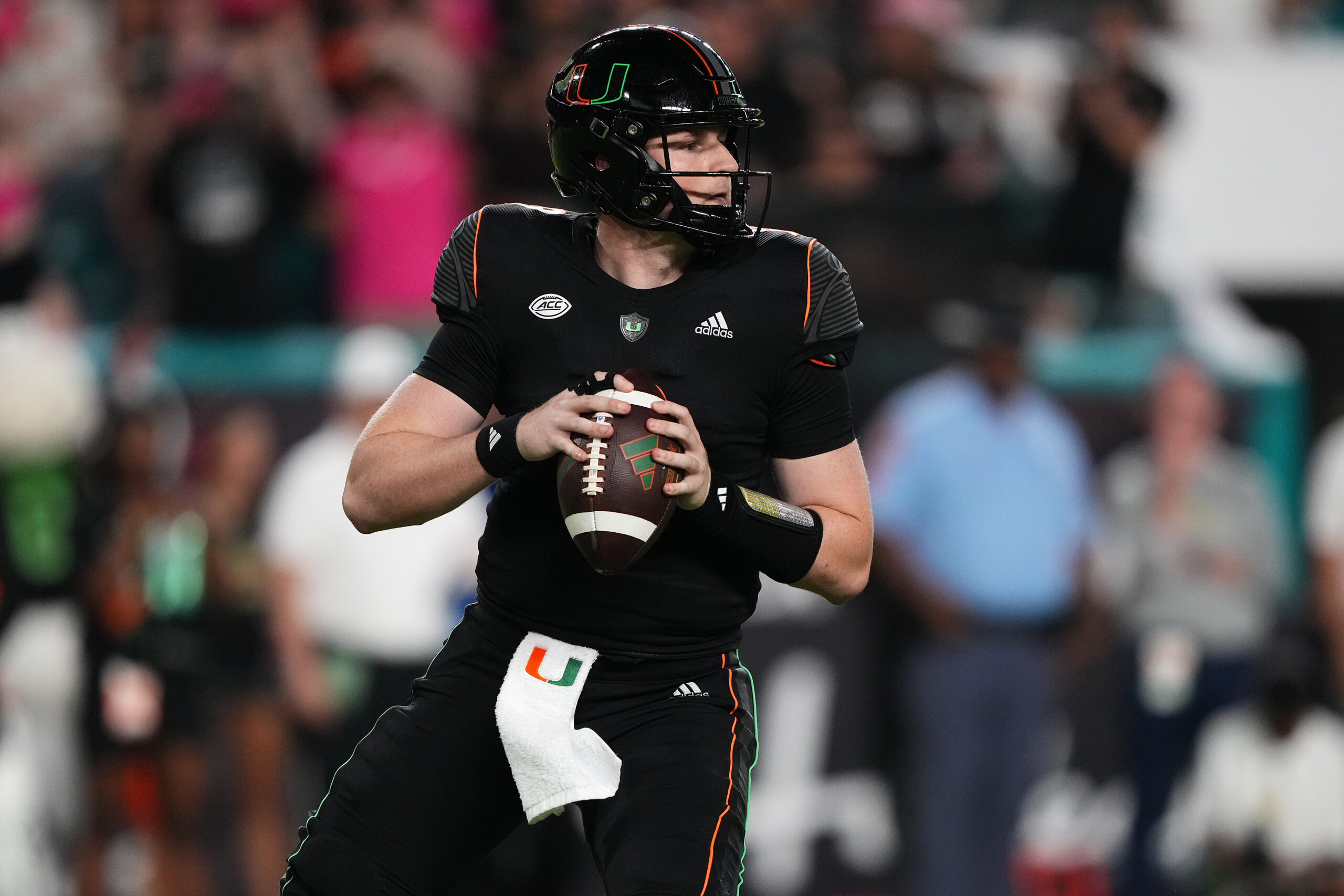 Oct 7, 2023; Miami Gardens, Florida, USA; Miami Hurricanes quarterback Tyler Van Dyke (9) attempts a pass against the Georgia Tech Yellow Jackets in the second half at Hard Rock Stadium. Mandatory Credit: Jasen Vinlove-USA TODAY Sports