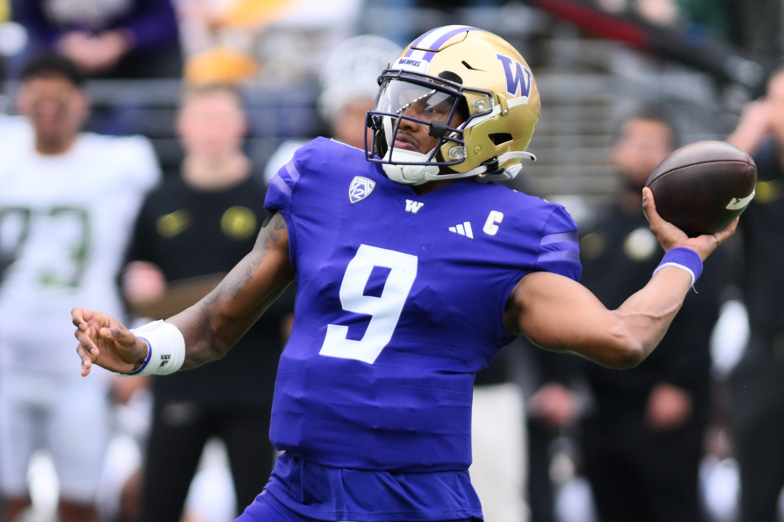 Oct 14, 2023; Seattle, Washington, USA; Washington Huskies quarterback Michael Penix Jr. (9) passes the ball against the Oregon Ducks during the first half at Alaska Airlines Field at Husky Stadium. 