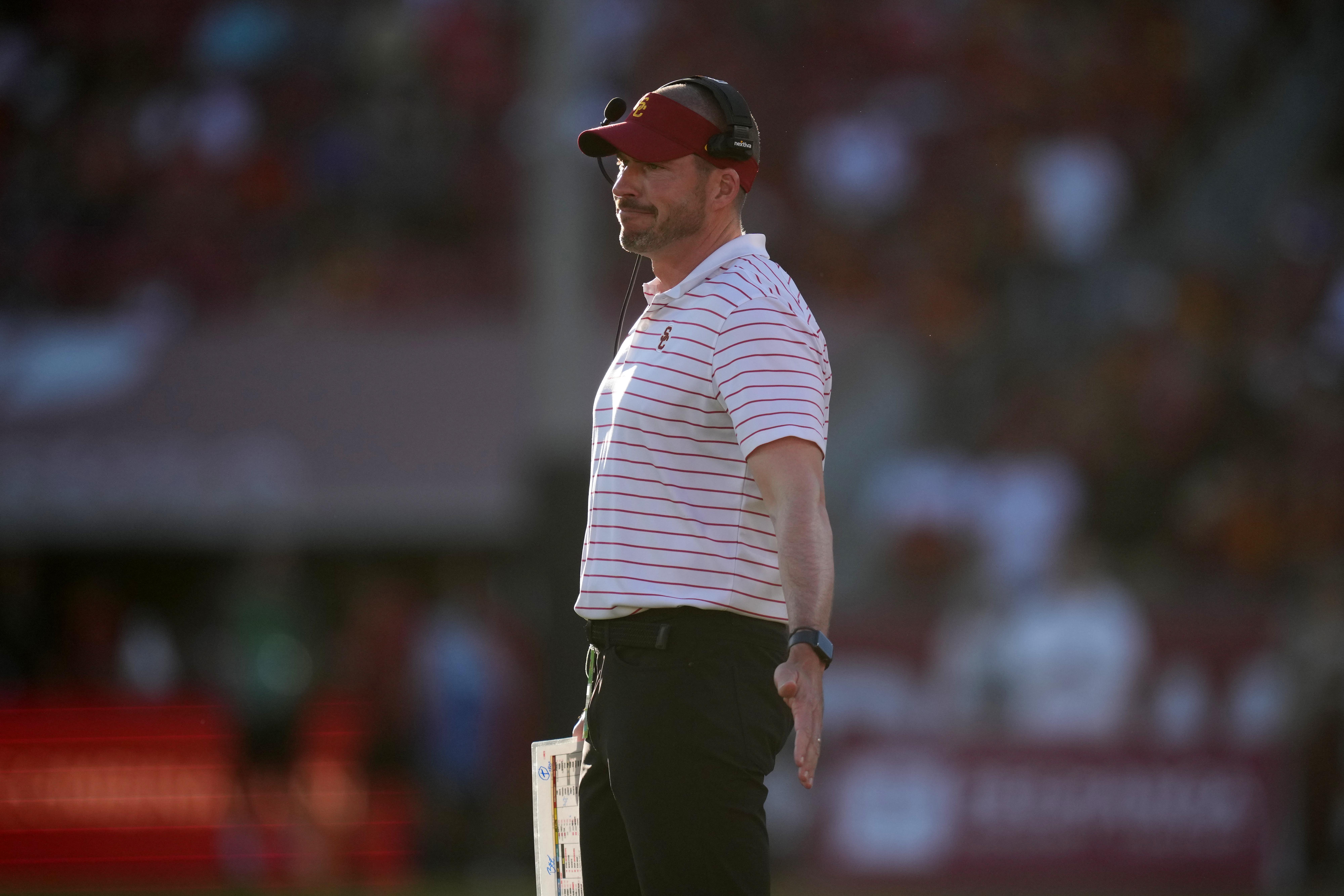 Oct 21, 2023; Los Angeles, California, USA; Southern California Trojans defensive coordinator Alex Grinch reacts against the Utah Utes in the first half at United Airlines Field at Los Angeles Memorial Coliseum.