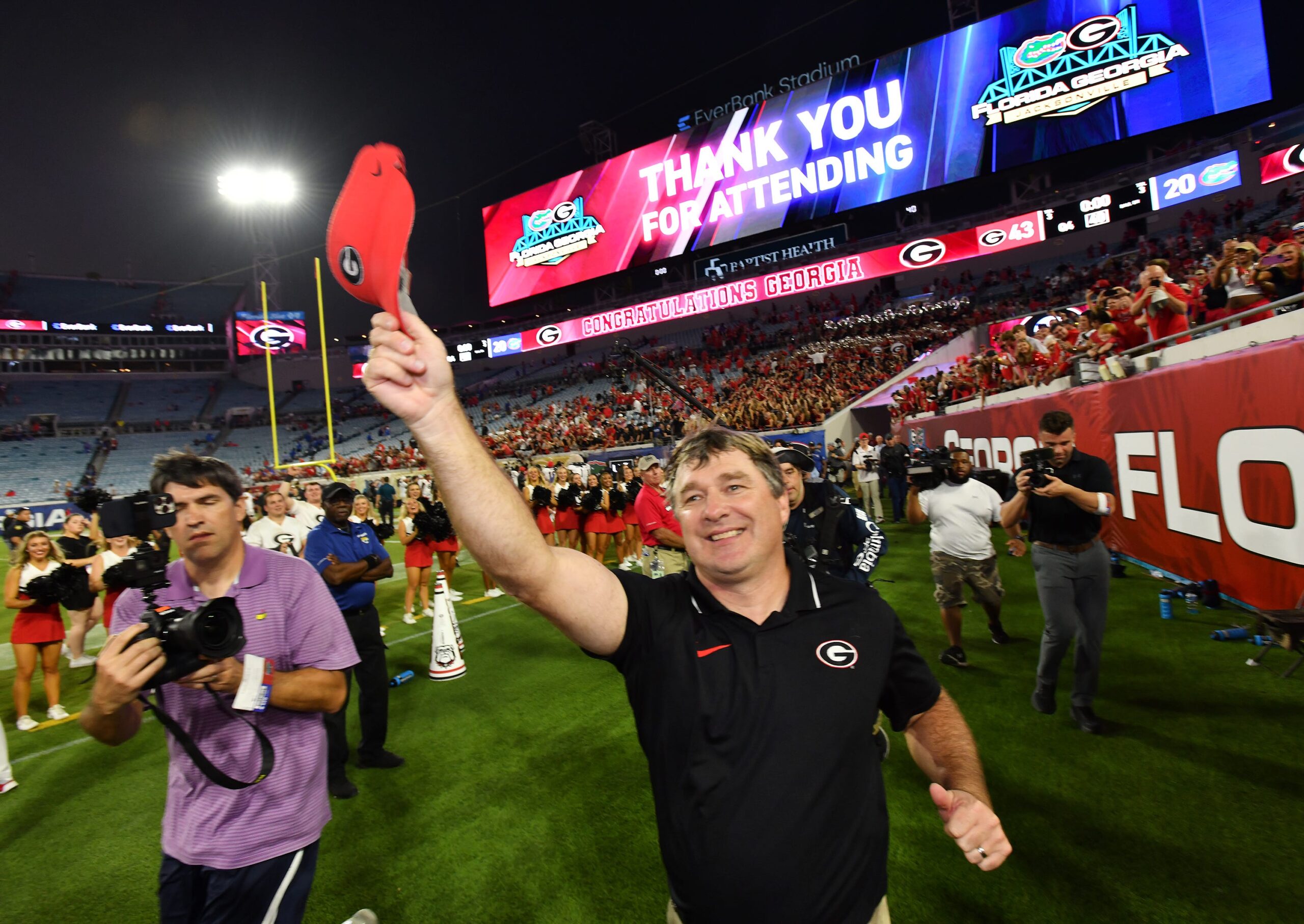 Georgia Bulldogs head coach Kirby Smart thanks fans as he runs down the sideline after Saturday night's victory over the Gators. The annual Florida vs Georgia football game at EverBank Stadium in Jacksonville, FL, Saturday, October 27, 2023. Georgia walked away with a final score of 43 to 20.