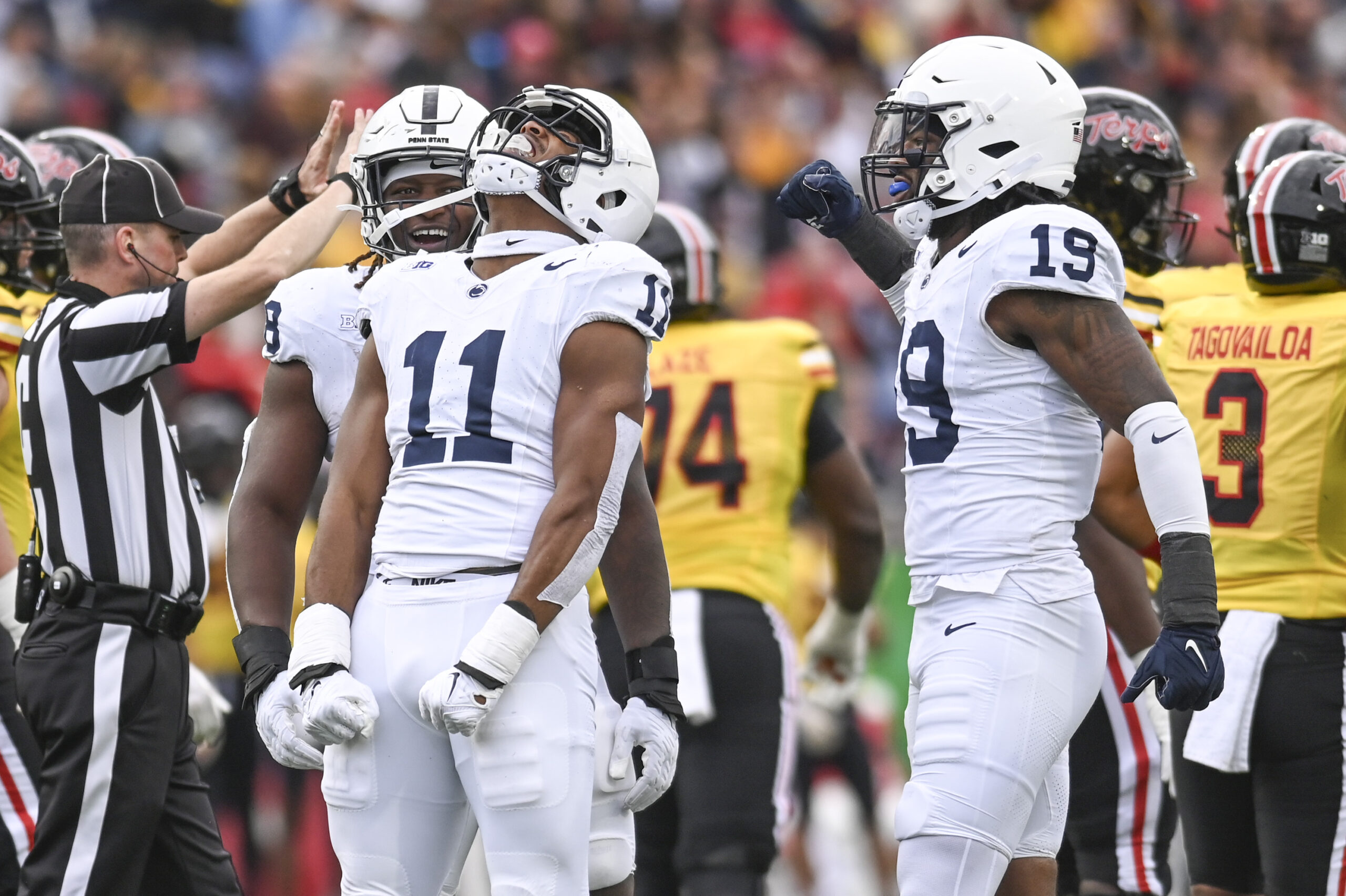 Nov 4, 2023; College Park, Maryland, USA; Penn State Nittany Lions linebacker Abdul Carter (11) celebrates after sacking Maryland Terrapins quarterback Taulia Tagovailoa (3) dung the first half at SECU Stadium.