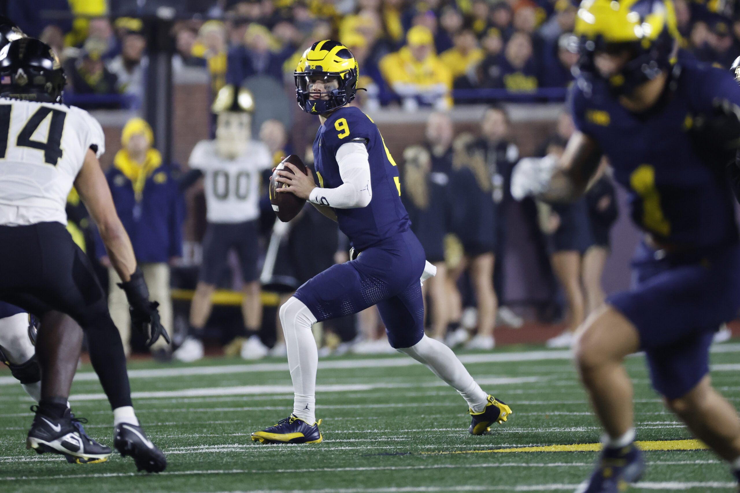 Nov 4, 2023; Ann Arbor, Michigan, USA; Michigan Wolverines quarterback J.J. McCarthy (9) looks to pass in the first half against the Purdue Boilermakers at Michigan Stadium.