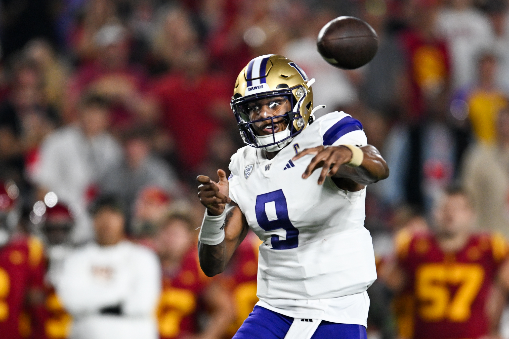 Nov 4, 2023; Los Angeles, California, USA; Washington Huskies quarterback Michael Penix Jr. (9) throws a pass against the USC Trojans during the second quarter at United Airlines Field at Los Angeles Memorial Coliseum.