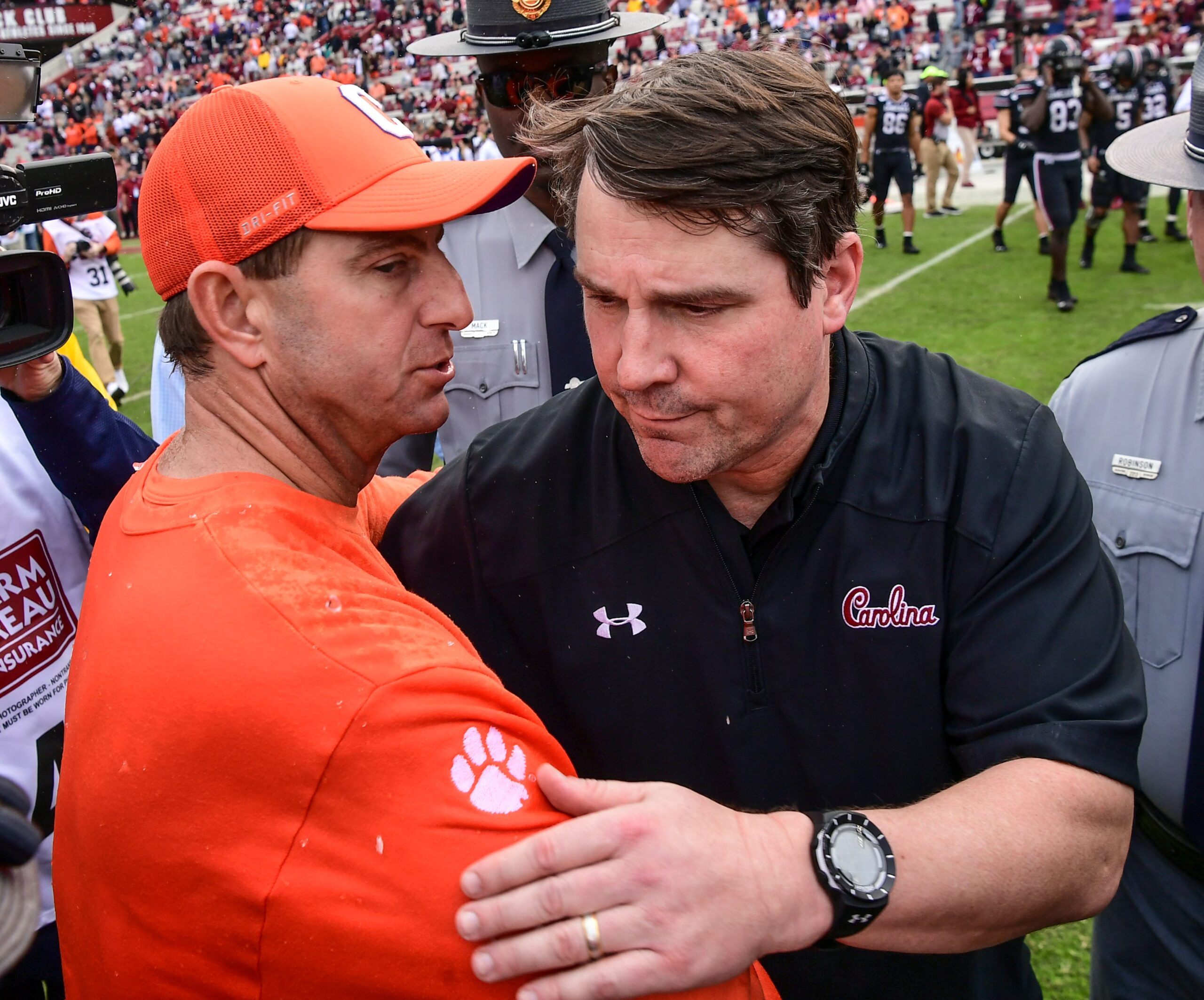 Clemson Head Coach Dabo Swinney shakes hands with South Carolina Head Coach Will Muschamp after a 38-3 win over USC at Williams-Brice Stadium in Columbia, South Carolina, on Saturday, November 30, 2019.