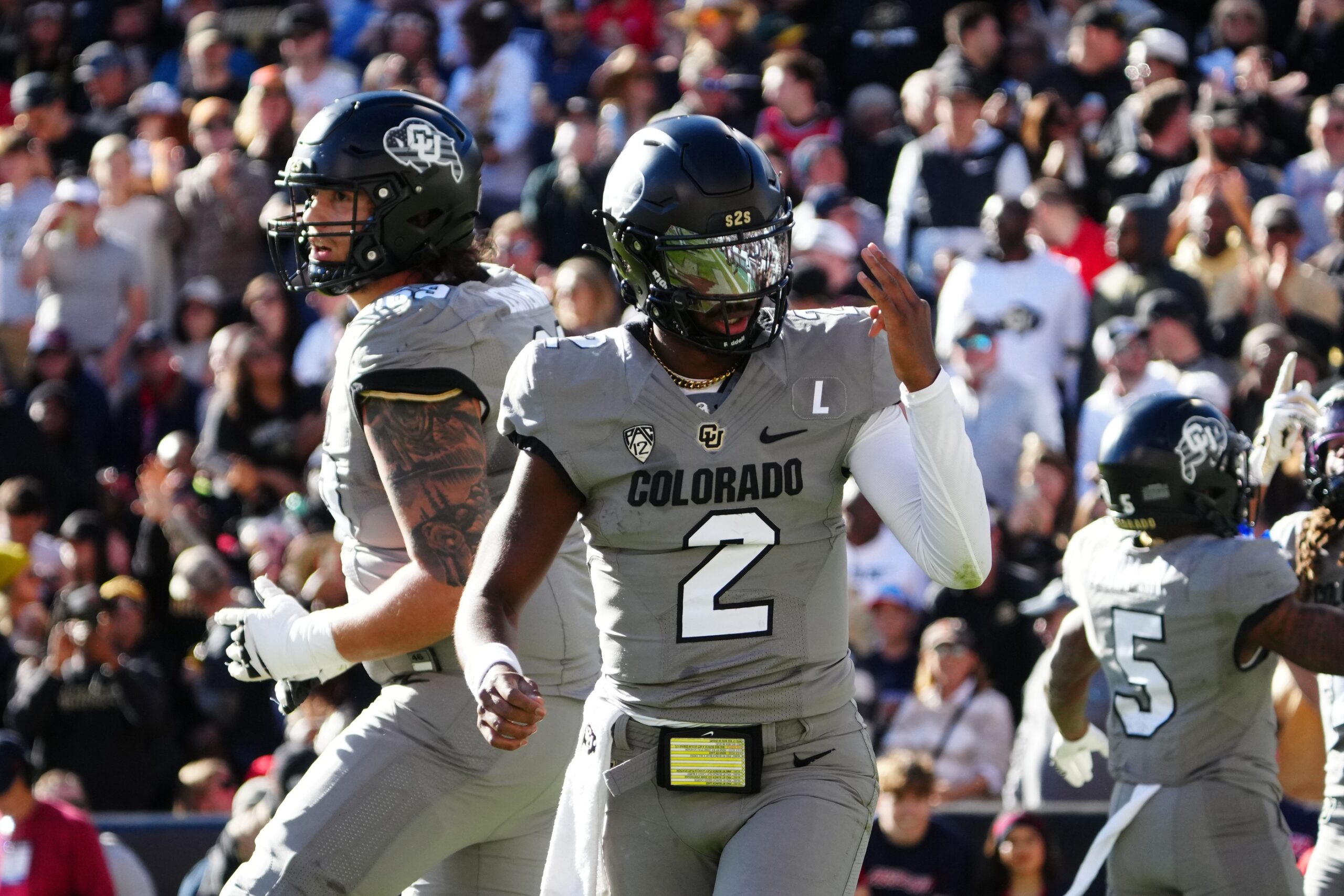Nov 11, 2023; Boulder, Colorado, USA; Colorado Buffaloes quarterback Shedeur Sanders (2) celebrates after a touchdown against the Arizona Wildcats in the second quarter at Folsom Field. 
