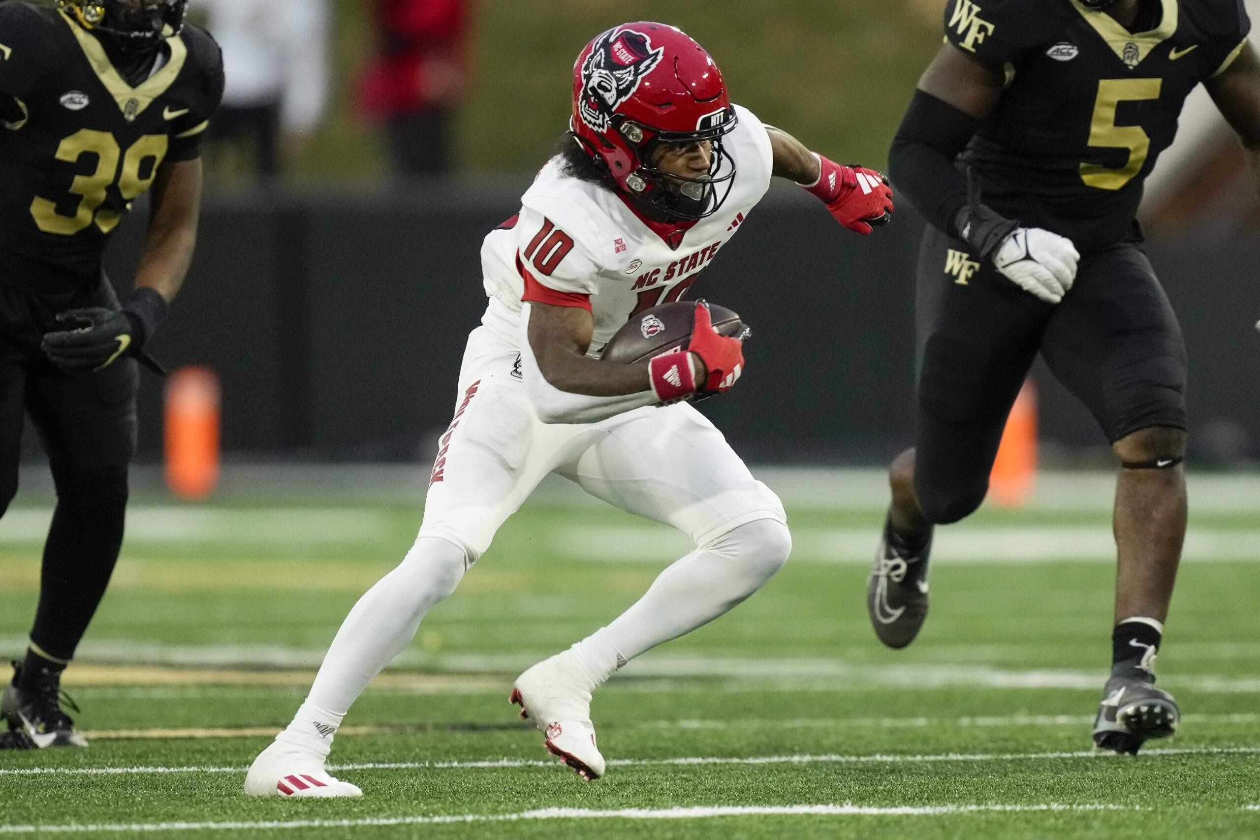 Nov 11, 2023; Winston-Salem, North Carolina, USA; North Carolina State Wolfpack wide receiver Kevin Concepcion (10) makes a cut against the Wake Forest Demon Deacons during the second half at Allegacy Federal Credit Union Stadium.