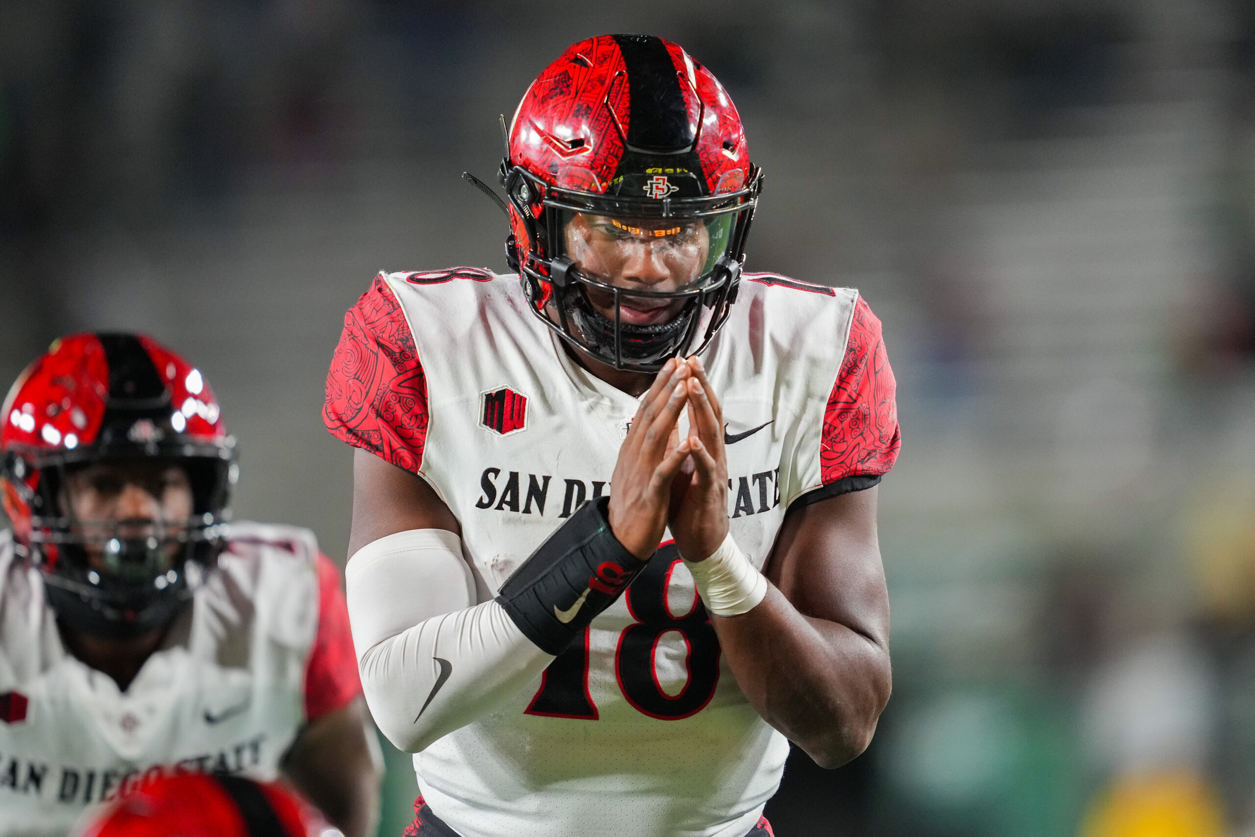 Nov 11, 2023; Fort Collins, Colorado, USA; San Diego State Aztecs quarterback Jalen Mayden (18) prepares to catch a snap during the fourth quarter against the Colorado State Rams at Sonny Lubick Field at Canvas Stadium. Mandatory Credit: Andrew Wevers-USA TODAY Sports