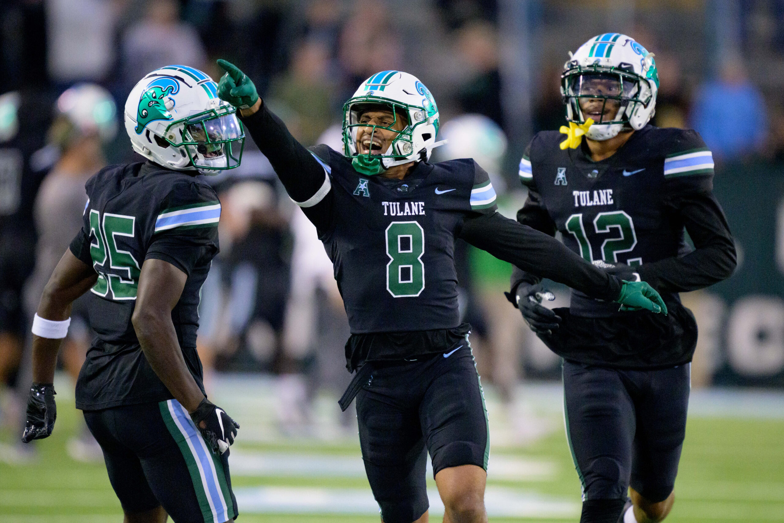 Nov 24, 2023; New Orleans, Louisiana, USA; Tulane Green Wave safety Kam Pedescleaux (8) celebrates forcing a fumble against the UTSA Roadrunners during the second half at Yulman Stadium. Mandatory Credit: Matthew Hinton-USA TODAY Sports
