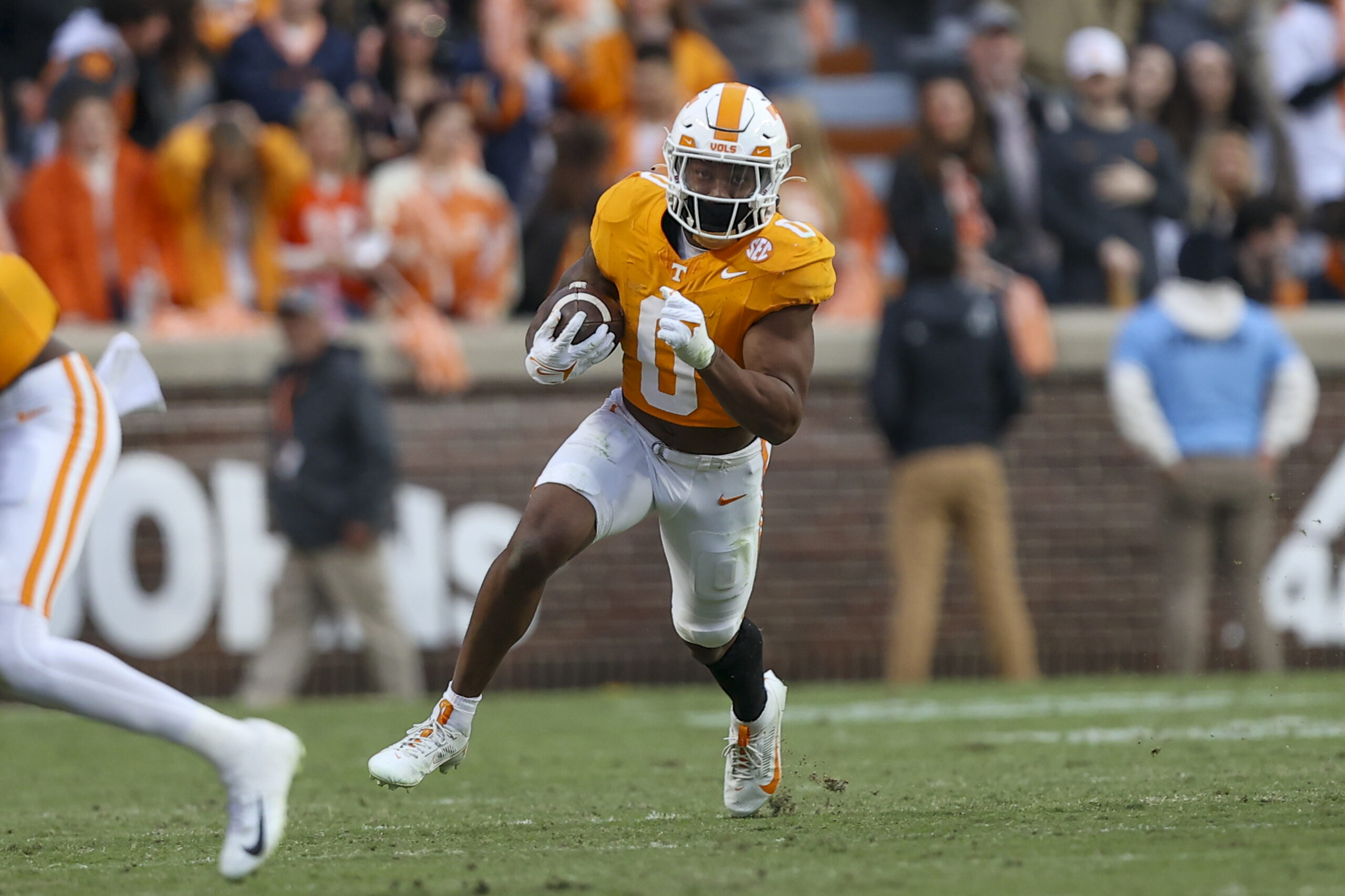 Nov 25, 2023; Knoxville, Tennessee, USA; Tennessee Volunteers running back Jaylen Wright (0) runs the ball against the Vanderbilt Commodores during the first half at Neyland Stadium