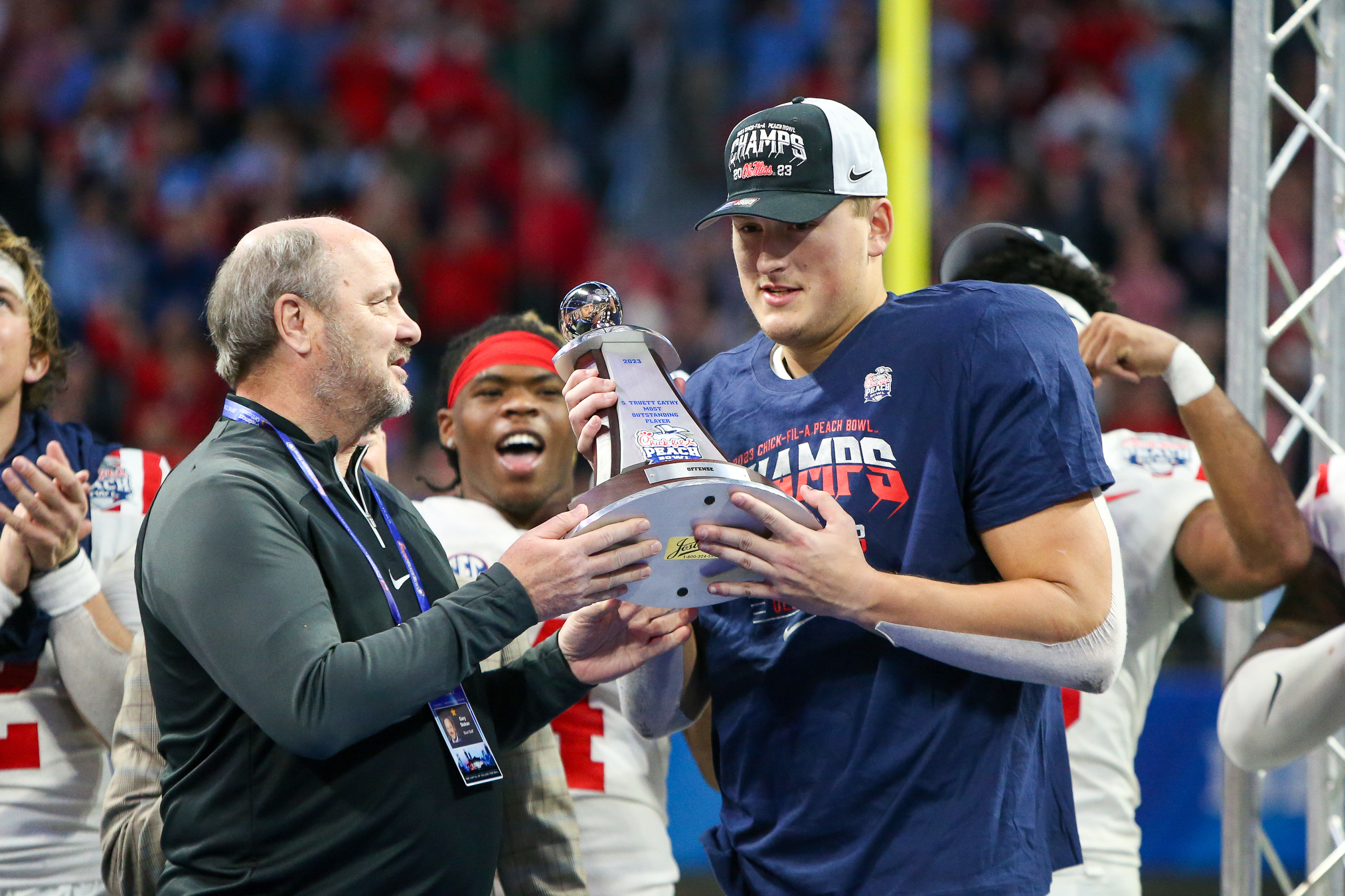 Dec 30, 2023; Atlanta, GA, USA; Mississippi Rebels tight end Caden Prieskorn (86) holds up the offensive MVP trophy after a victory against the Penn State Nittany Lions in the Peach Bowl at Mercedes-Benz Stadium. Mandatory Credit: Brett Davis-USA TODAY Sports