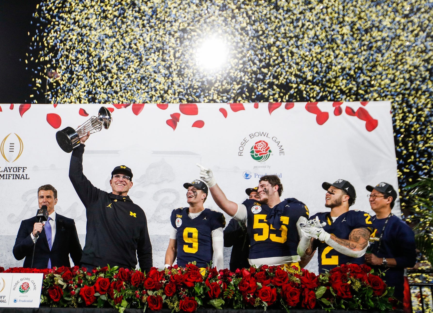 Michigan head coach Jim Harbaugh lifts up the Rose Bowl trophy after 27-20 win over Alabama at Rose Bowl Stadium in Pasadena, Calif. on Monday, Jan. 1, 2024.
