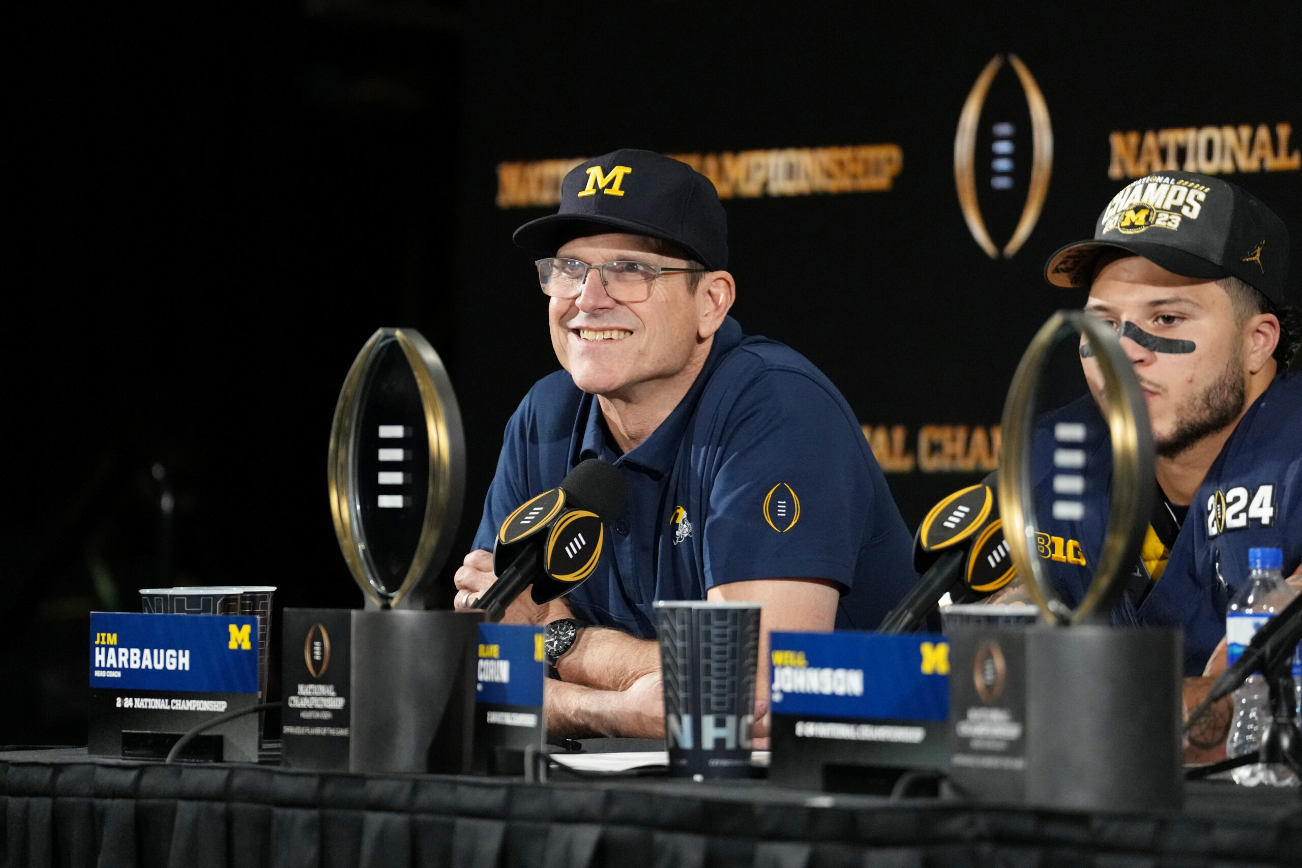 Jan 8, 2024; Houston, TX, USA; Michigan Wolverines head coach Jim Harbaugh smiles during a press conference after winning 2024 College Football Playoff national championship game against the Washington Huskies at NRG Stadium.