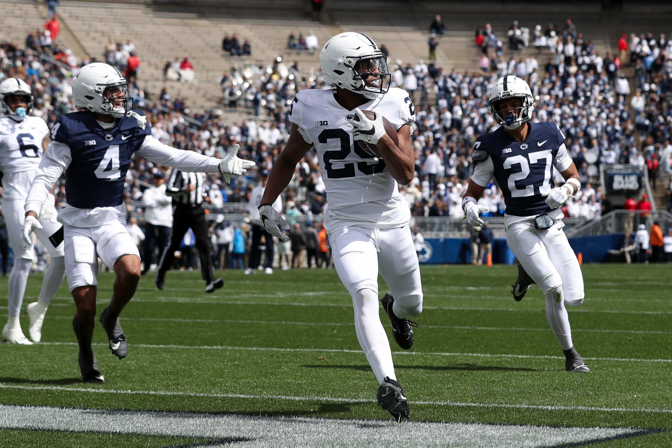 Apr 13, 2024; University Park, PA, USA; Penn State Nittany Lions running back Quinton Martin Jr (25) runs the ball into the end zone for a touchdown during the second quarter of the Blue White spring game at Beaver Stadium. 