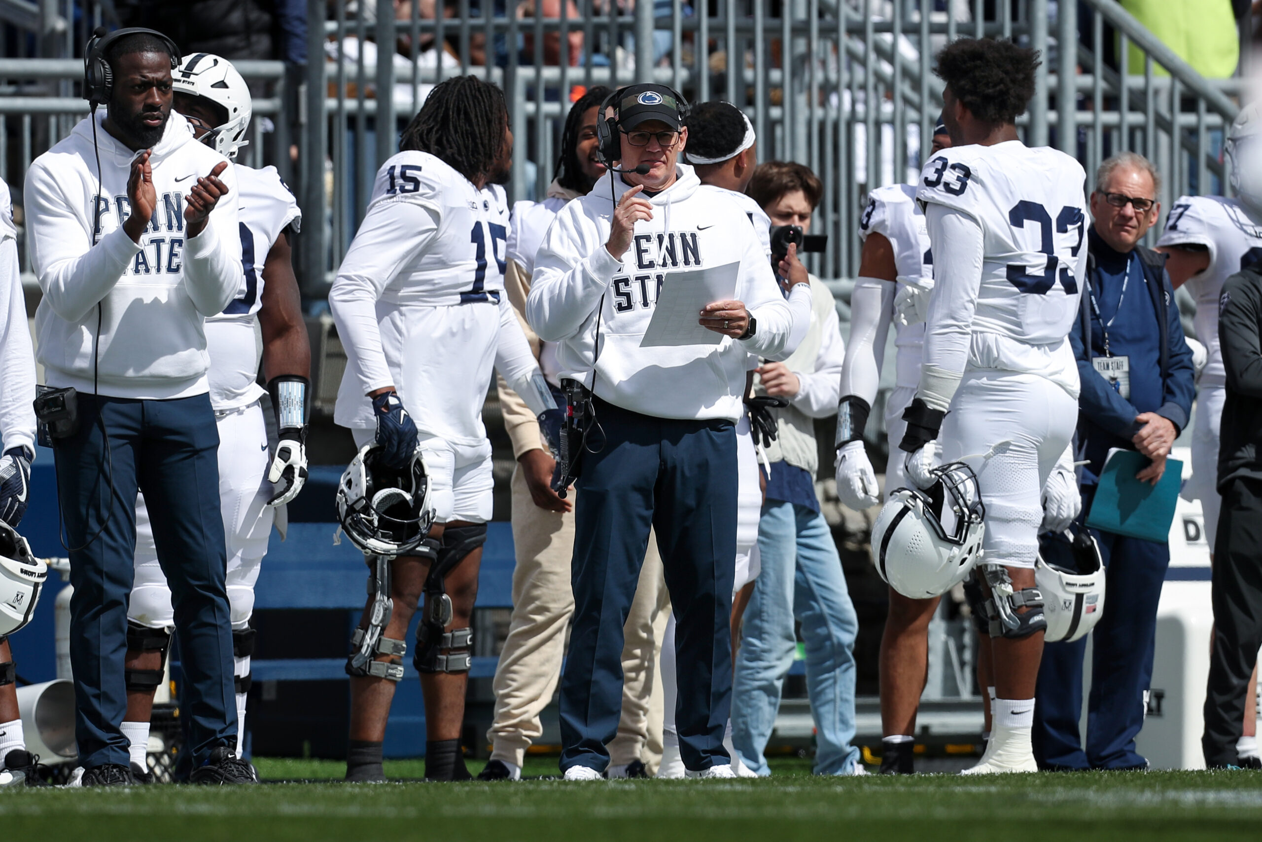 Apr 13, 2024; University Park, PA, USA; Penn State Nittany Lions defensive coordinator Tom Allen (center) looks on from the sideline during the second quarter of the Blue White spring game at Beaver Stadium. The White team defeated the Blue team 27-0. Mandatory Credit: Matthew O'Haren-USA TODAY Sports