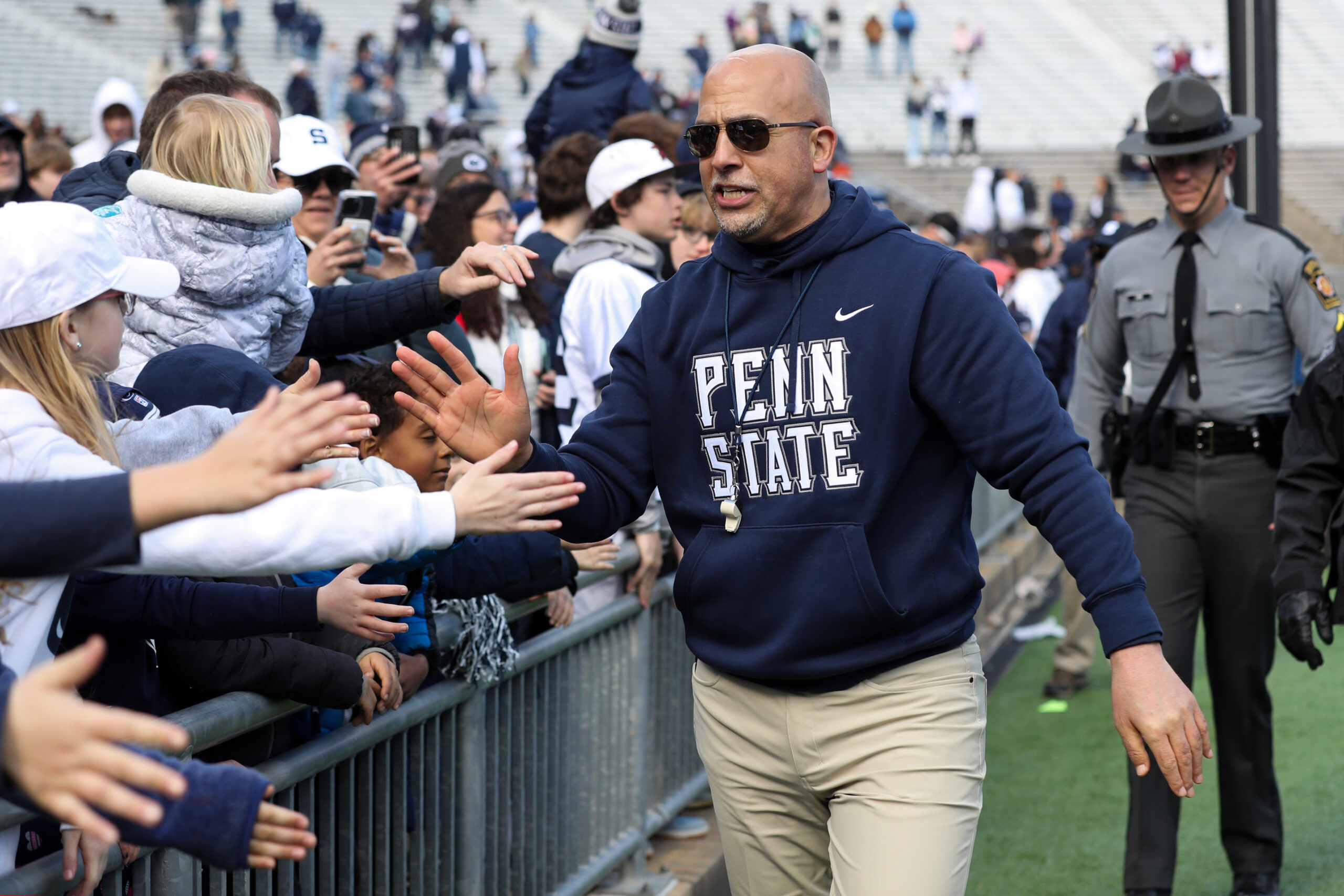 Apr 13, 2024; University Park, PA, USA; Penn State Nittany Lions head coach James Franklin shakes the hands of fans following the conclusion of the Blue White spring game at Beaver Stadium. The White team defeated the Blue team 27-0.