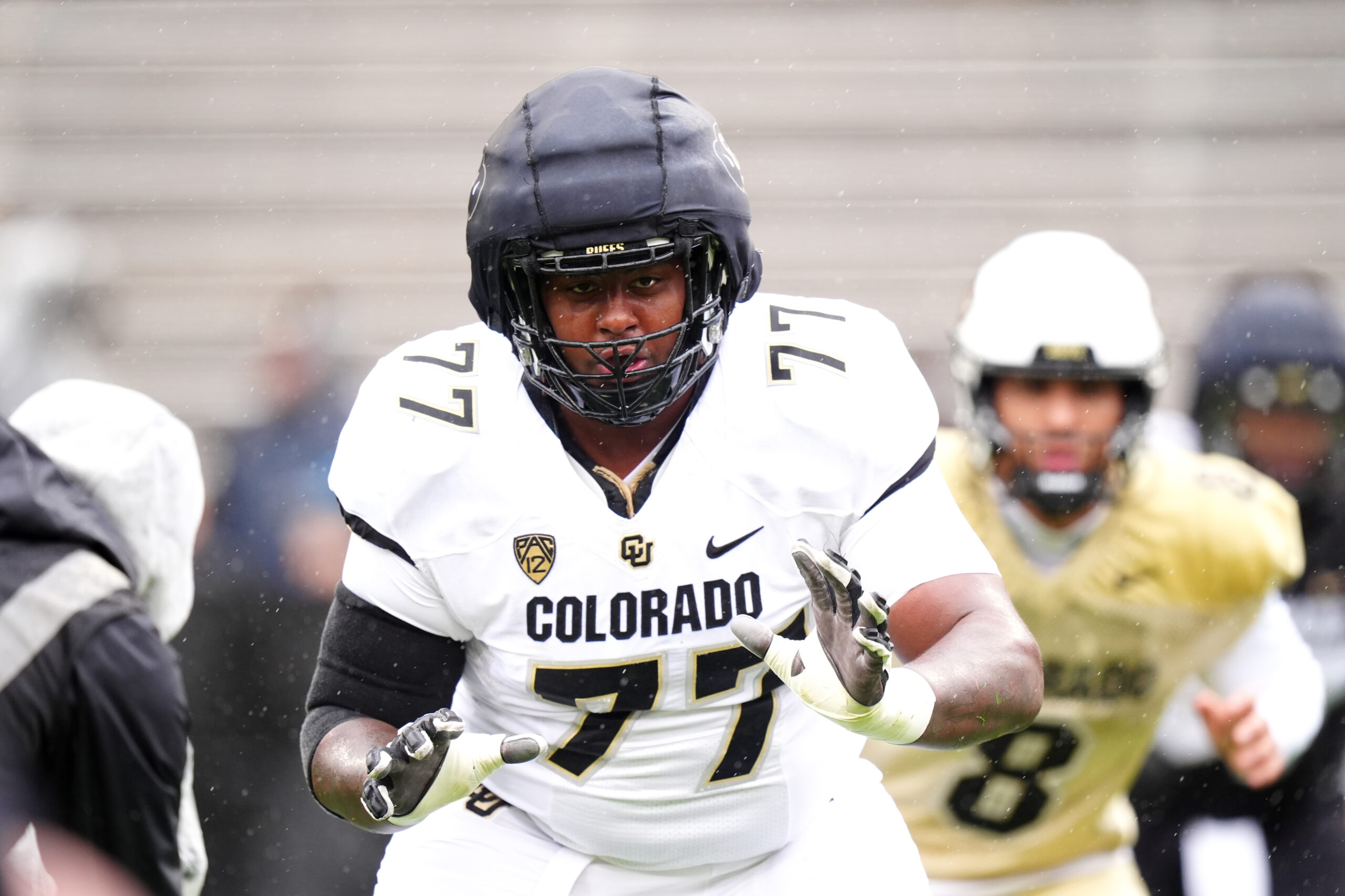 Apr 27, 2024; Boulder, CO, USA; Colorado Buffaloes offensive tackle Jordan Seaton (77) warms up during a spring game event at Folsom Field.