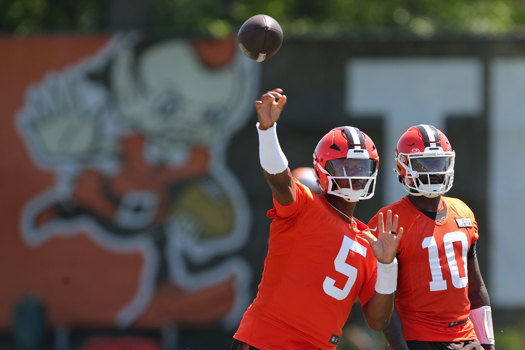 Browns quarterback Jameis Winston throws as quarterback Tyler Huntley watches during minicamp, Wednesday, June 12, 2024, in Berea.