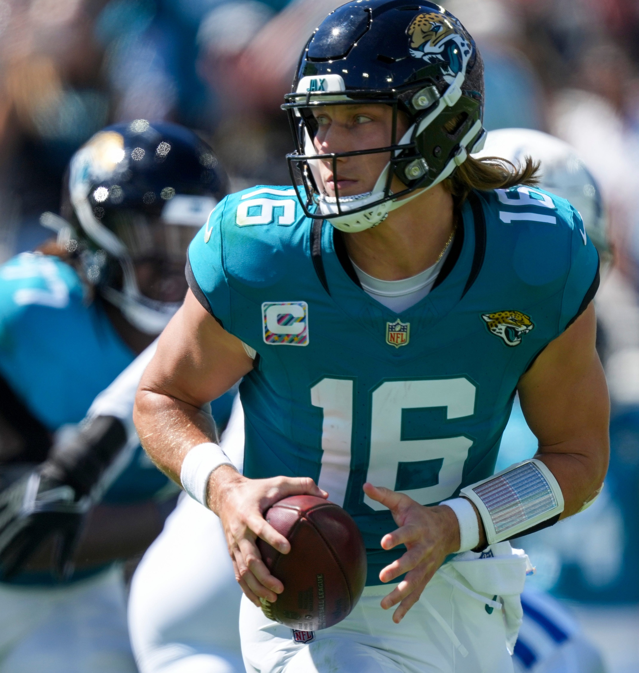 Jacksonville Jaguars quarterback Trevor Lawrence (16) is pressured during game action at EverBank Stadium on Sunday, Oct 15, 2023, in Jacksonville.