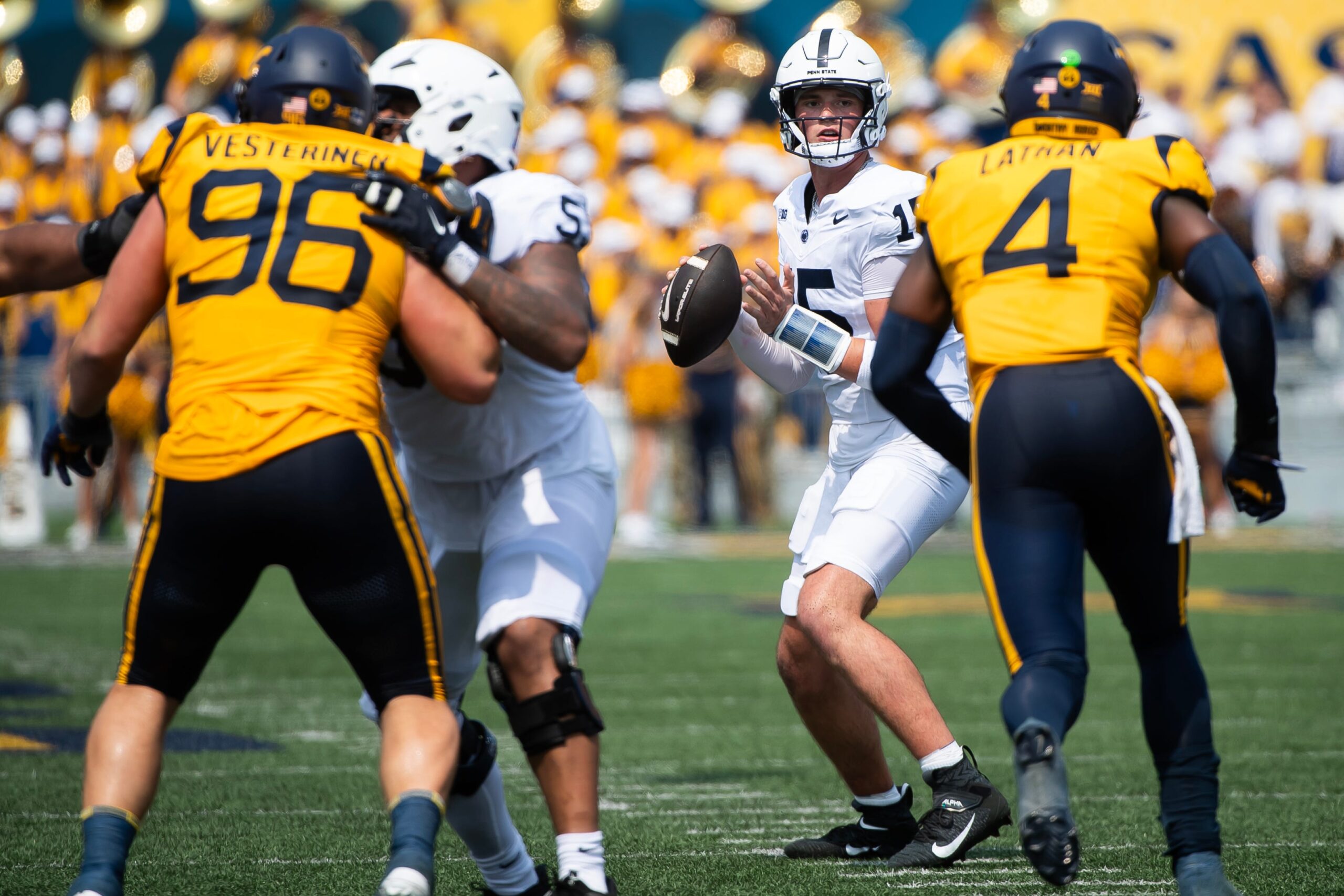Penn State quarterback Drew Allar (15) looks to throw in the first half of an NCAA football game against West Virginia, Saturday, August 31, 2024, in Morgantown, W. Va.