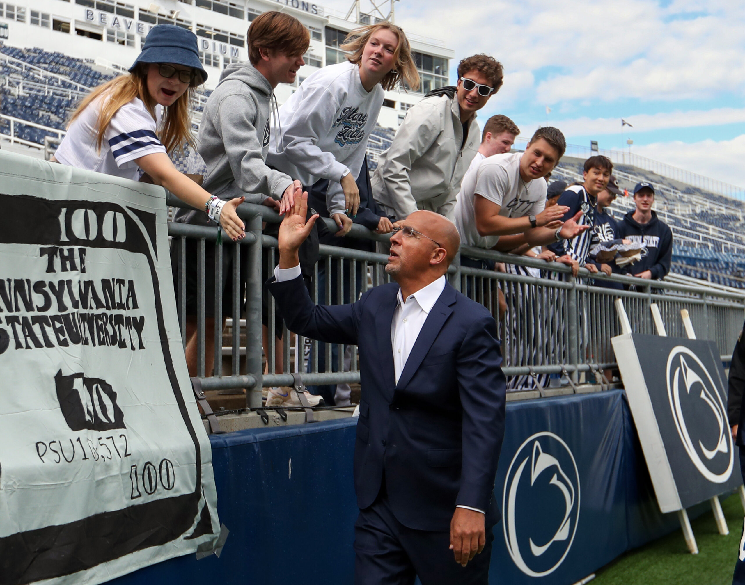 Sep 7, 2024; University Park, Pennsylvania, USA; Penn State Nittany Lions head coach James Franklin shakes hands with a group of fans prior to the game against the Bowling Green Falcons at Beaver Stadium