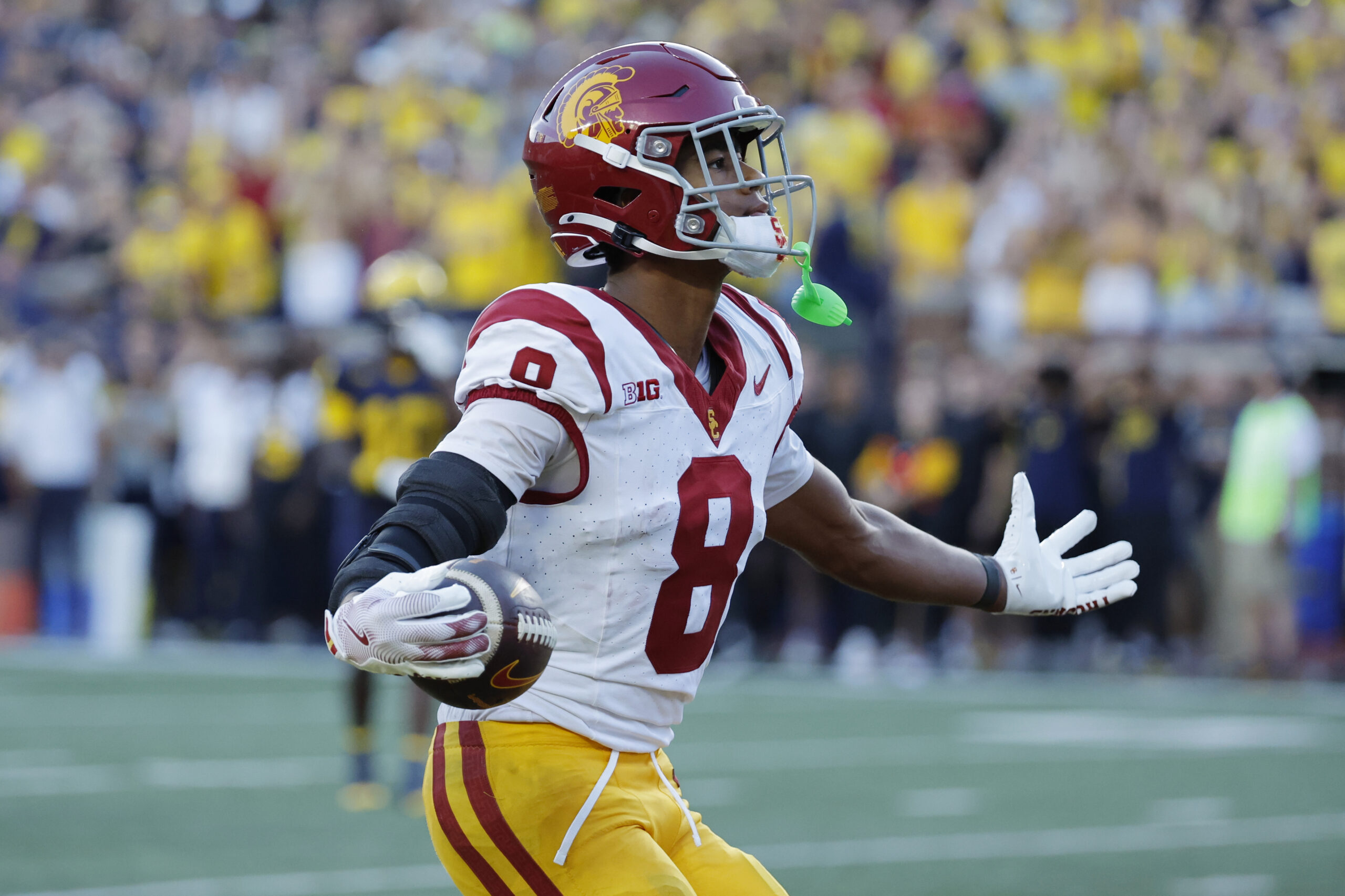 Sep 21, 2024; Ann Arbor, Michigan, USA; USC Trojans wide receiver Ja'Kobi Lane (8) celebrates a touchdown in the second half against the Michigan Wolverines at Michigan Stadium.