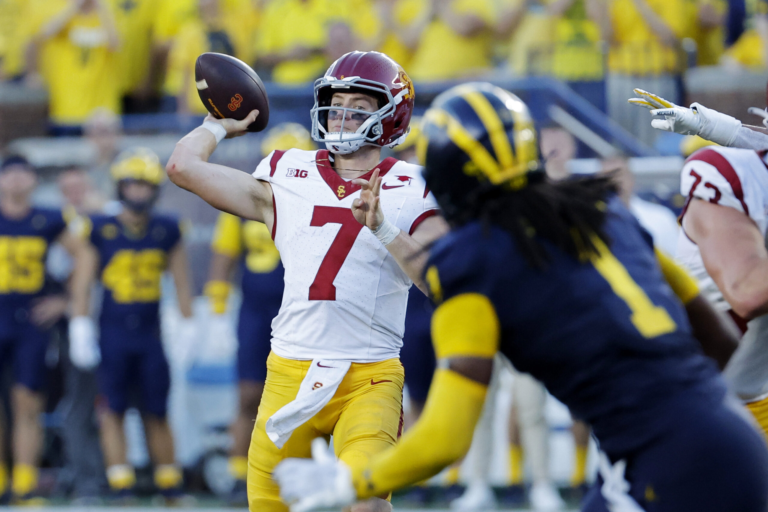 Sep 21, 2024; Ann Arbor, Michigan, USA; USC Trojans quarterback Miller Moss (7) passes in the second half against the Michigan Wolverines at Michigan Stadium.
