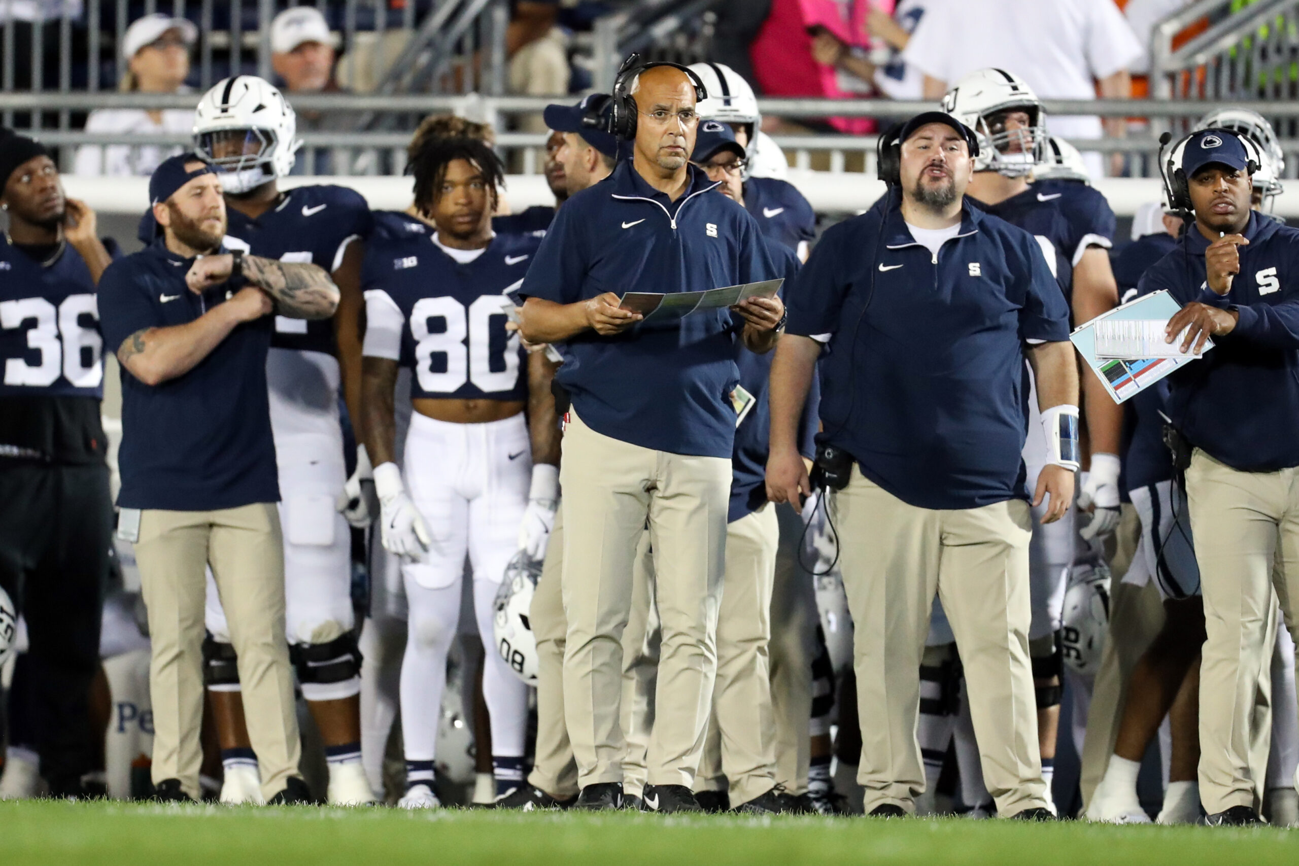Sep 28, 2024; University Park, Pennsylvania, USA; Penn State Nittany Lions head coach James Franklin (center) on the sideline during the first quarter against the Illinois Fighting Illini at Beaver Stadium.