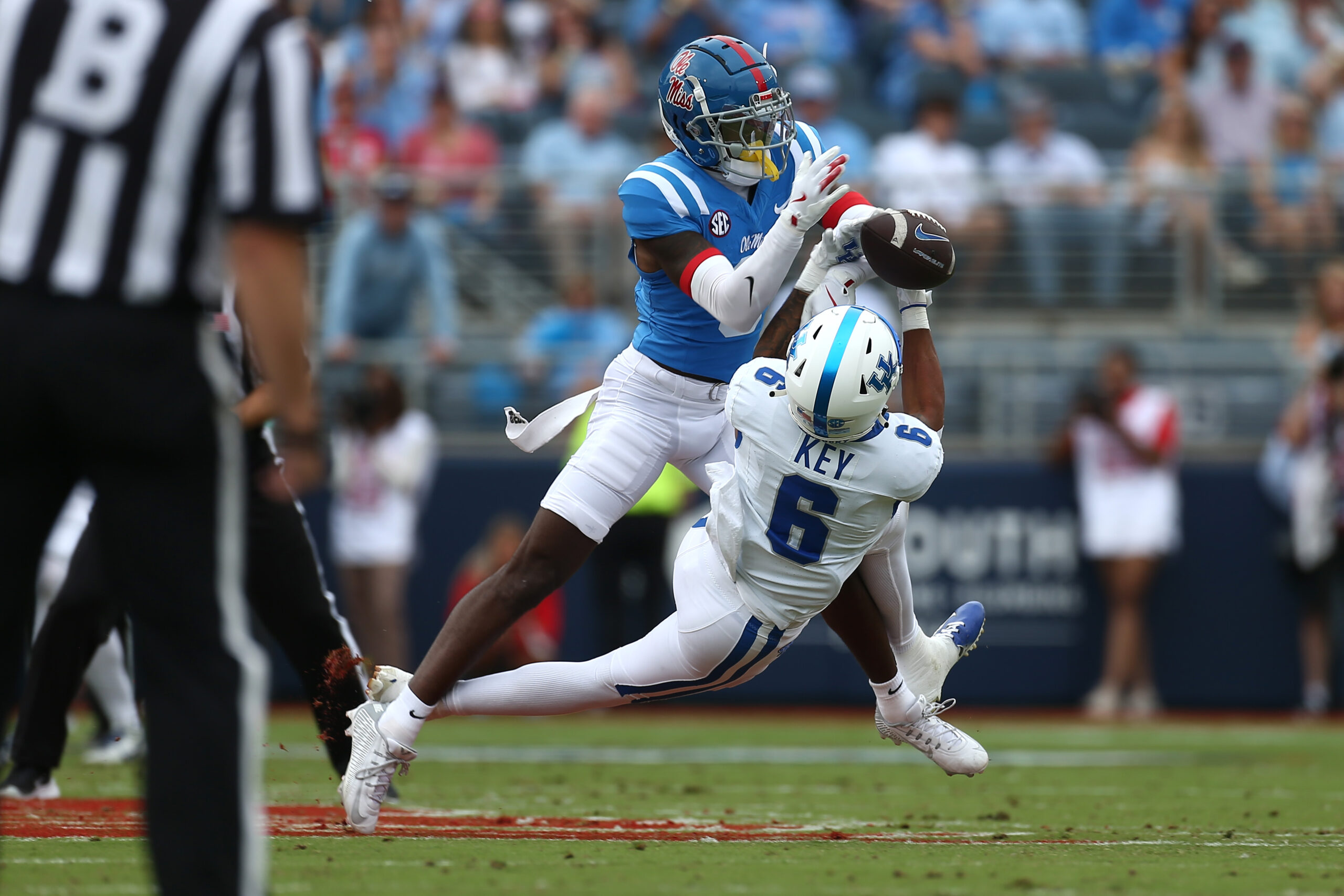 Sep 28, 2024; Oxford, Mississippi, USA; Mississippi Rebels defensive back Trey Amos (9) breaks up a pass intended for Kentucky Wildcats wide receiver Dane Key (6) during the first half at Vaught-Hemingway Stadium.